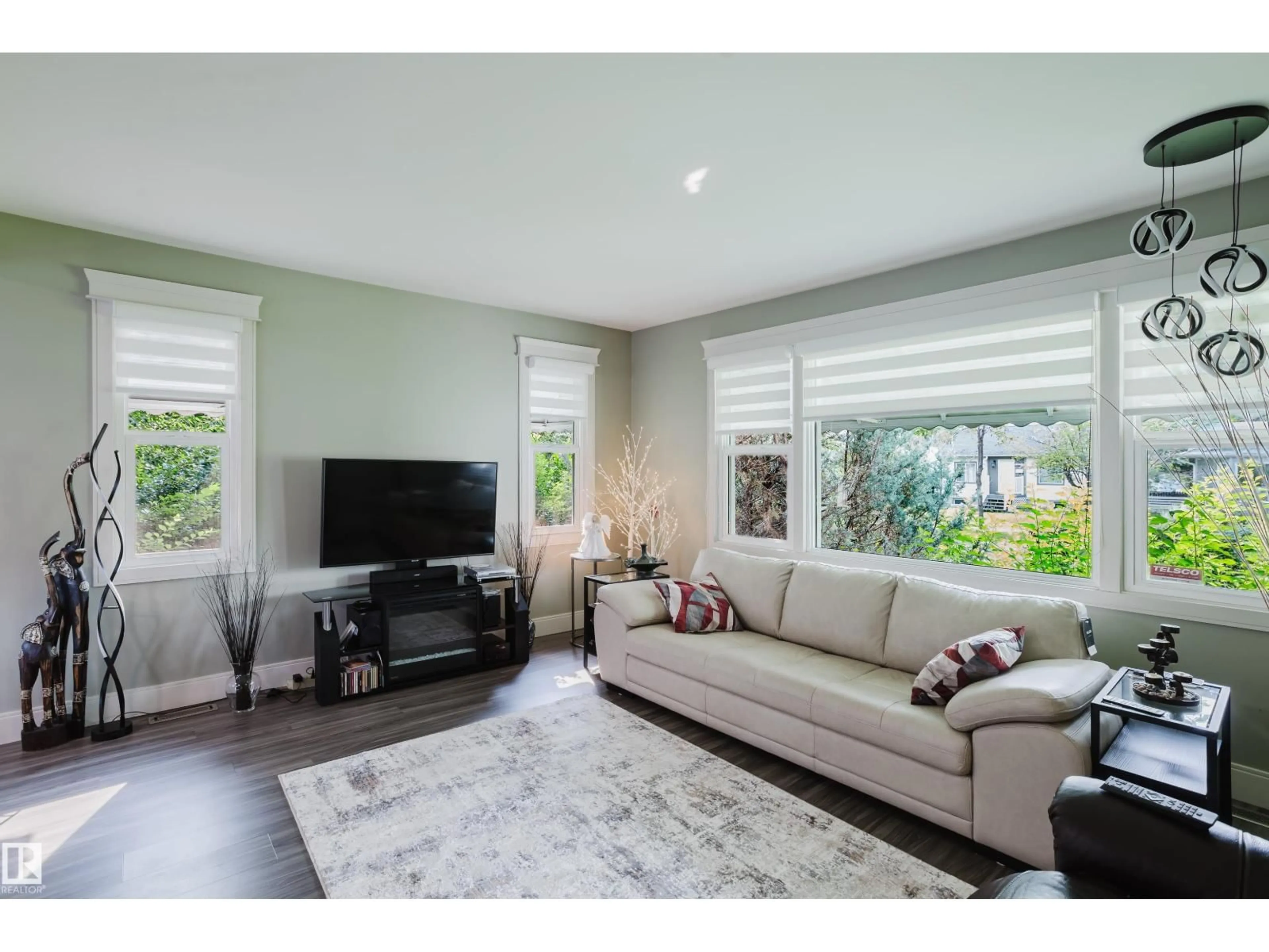 Living room with furniture, unknown for NW - 14814 104 AV, Edmonton Alberta T5N0X7