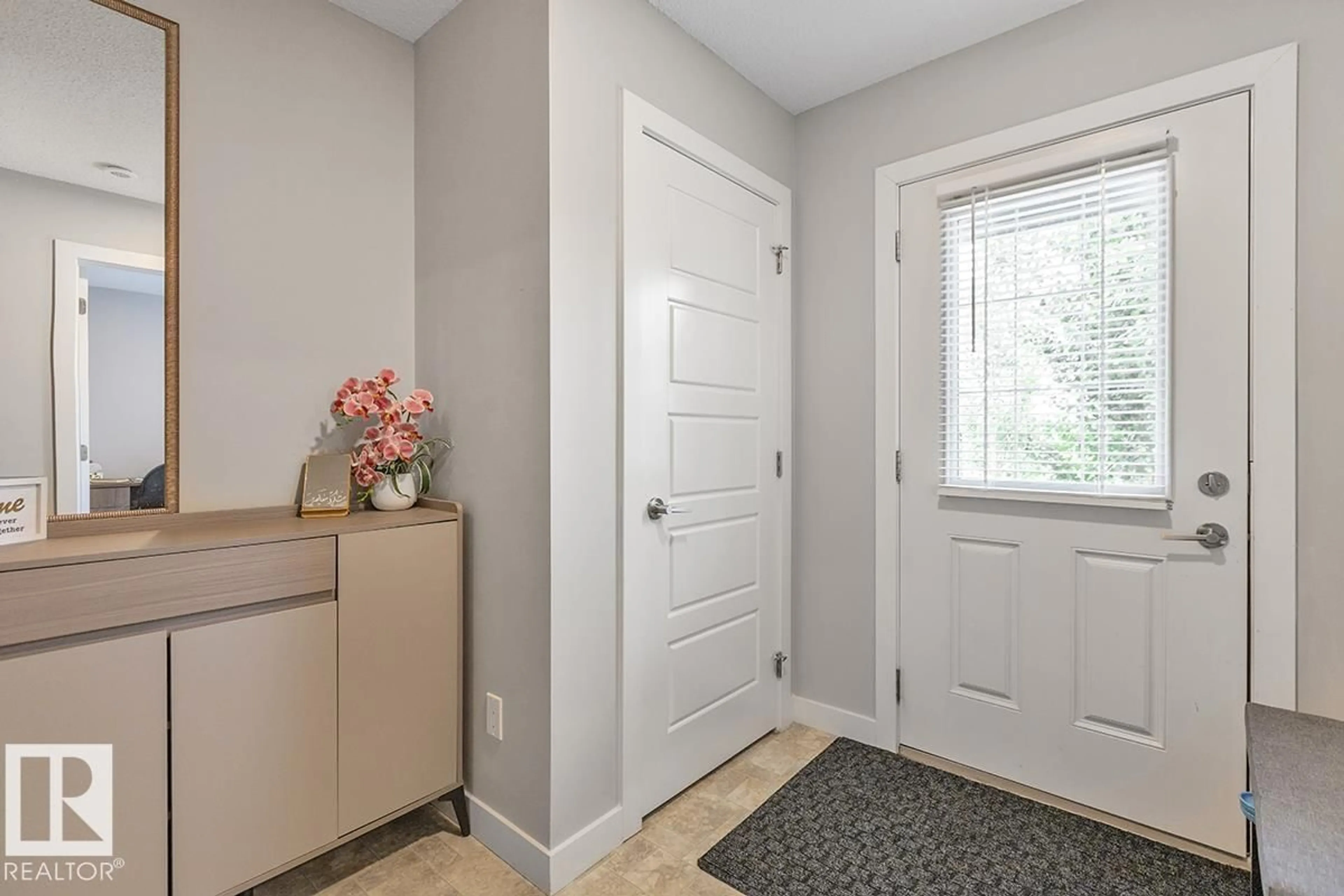 Indoor entryway for #22 - 3025 151 AV, Edmonton Alberta T5Y3W4