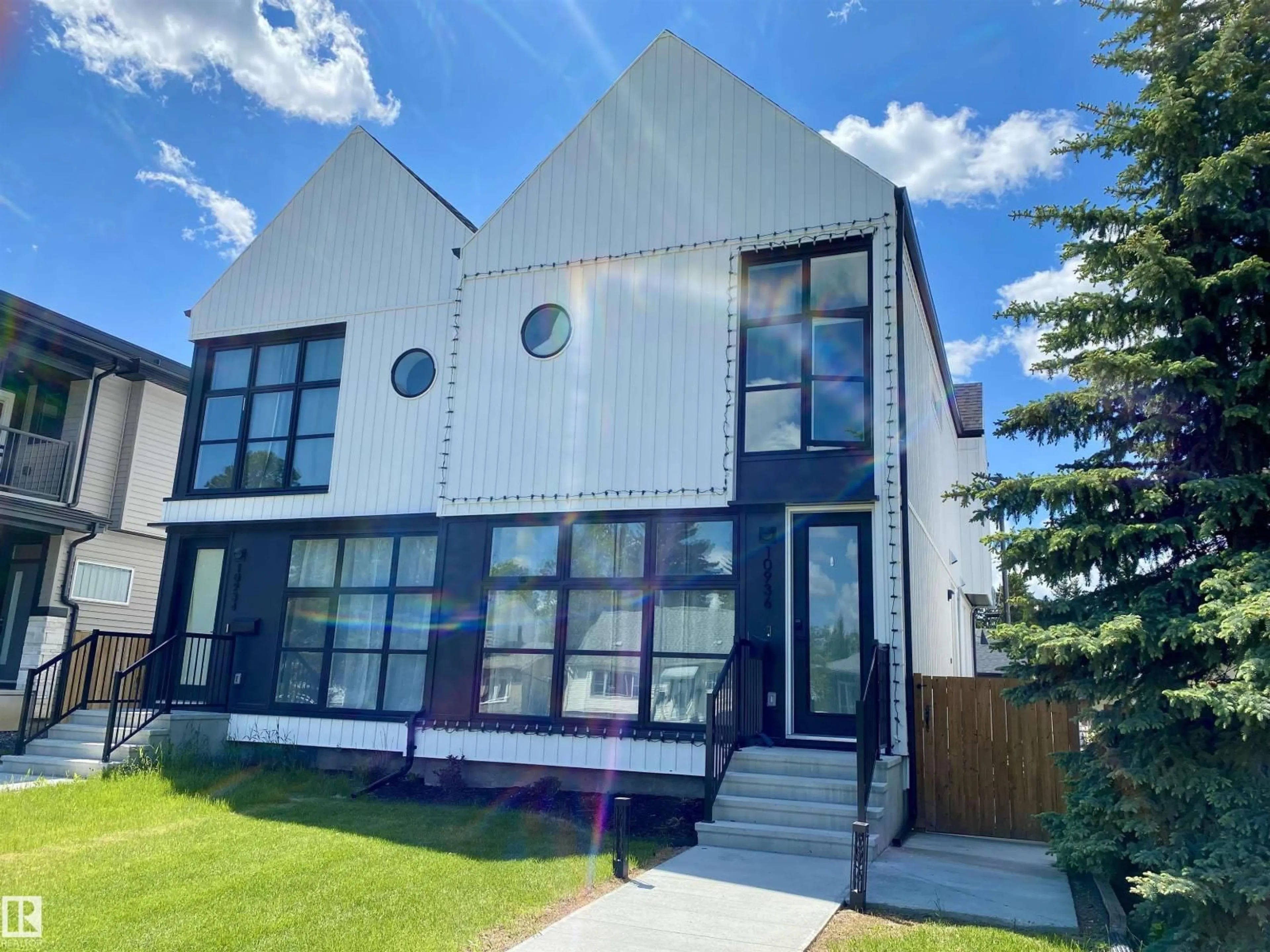 Home with vinyl exterior material, street for 10936 117 ST, Edmonton Alberta T5H3N6