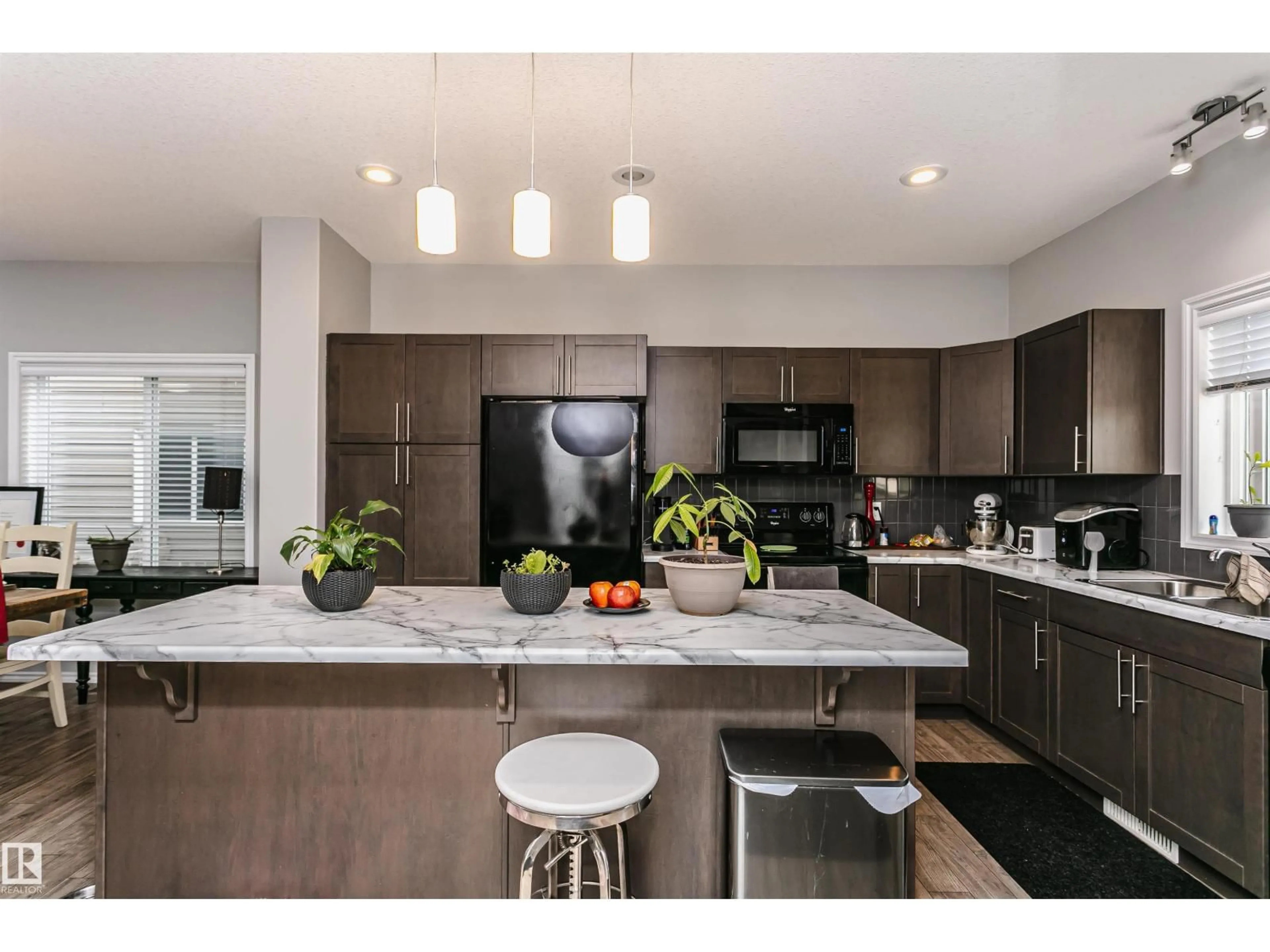 Open concept kitchen, unknown for 21931 91 AV, Edmonton Alberta T5T6Z8