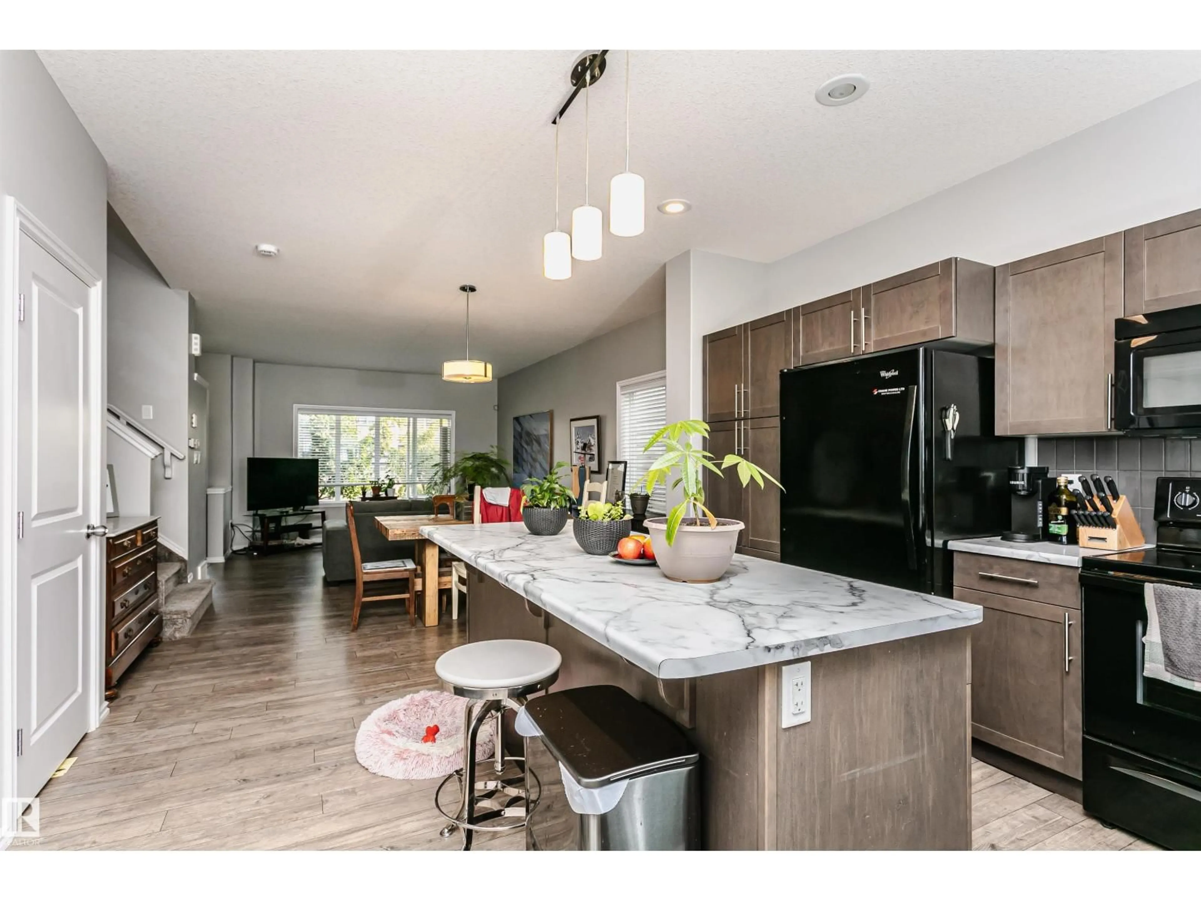 Open concept kitchen, unknown for 21931 91 AV, Edmonton Alberta T5T6Z8