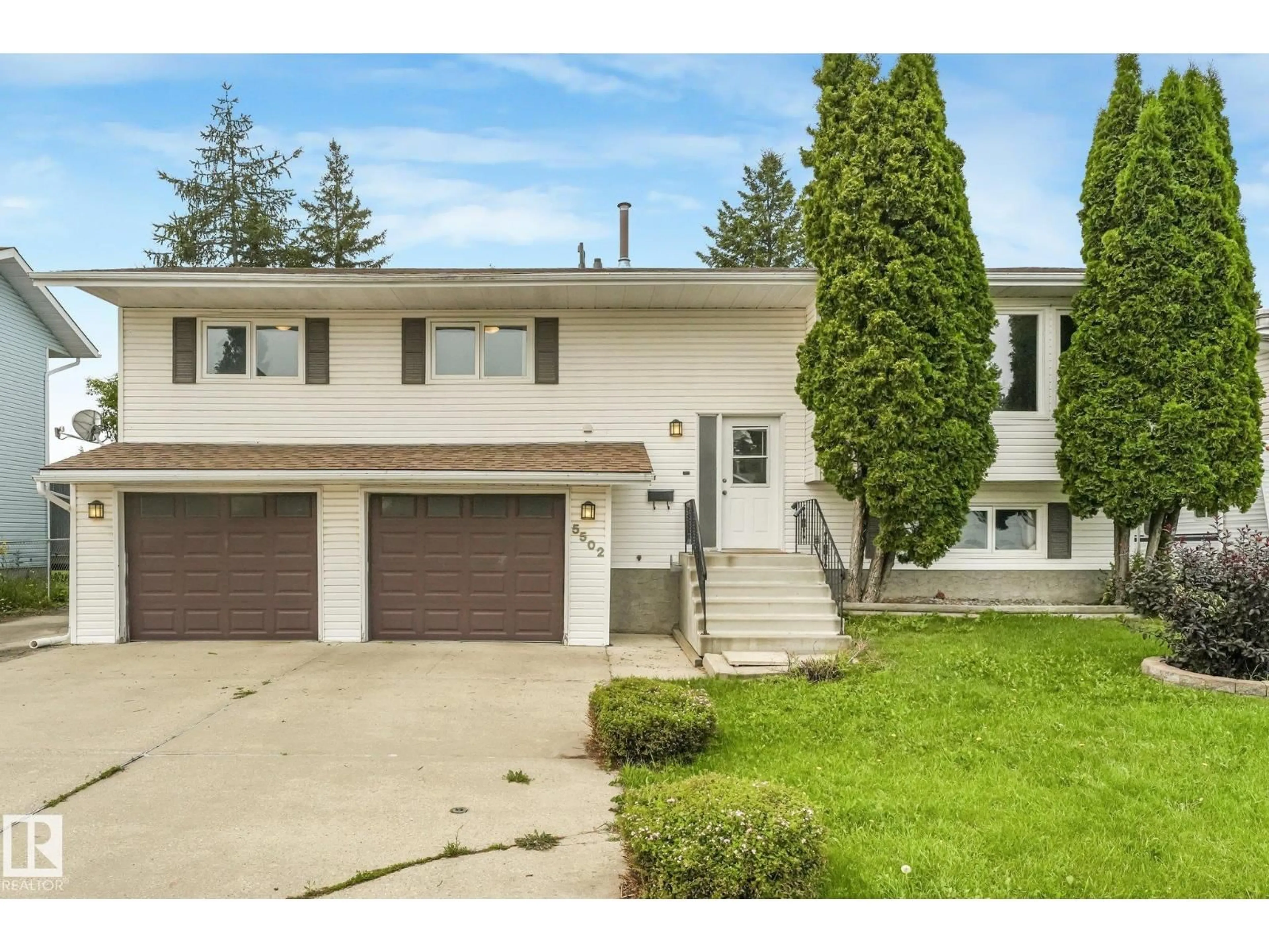 Home with vinyl exterior material, street for 5502 45 ST, Stony Plain Alberta T7Z1C9
