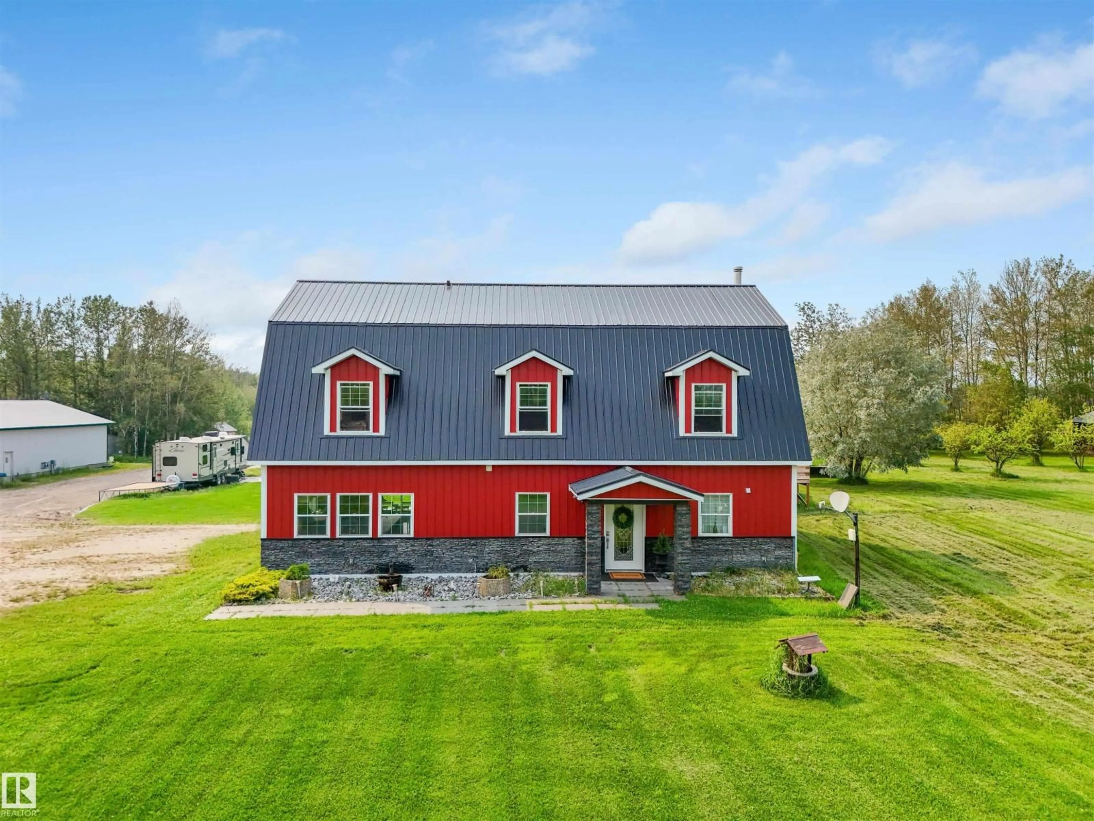 A pic from outside/outdoor area/front of a property/back of a property/a pic from drone, building for 49218 RGE ROAD 80, Rural Brazeau County Alberta T7A2A1