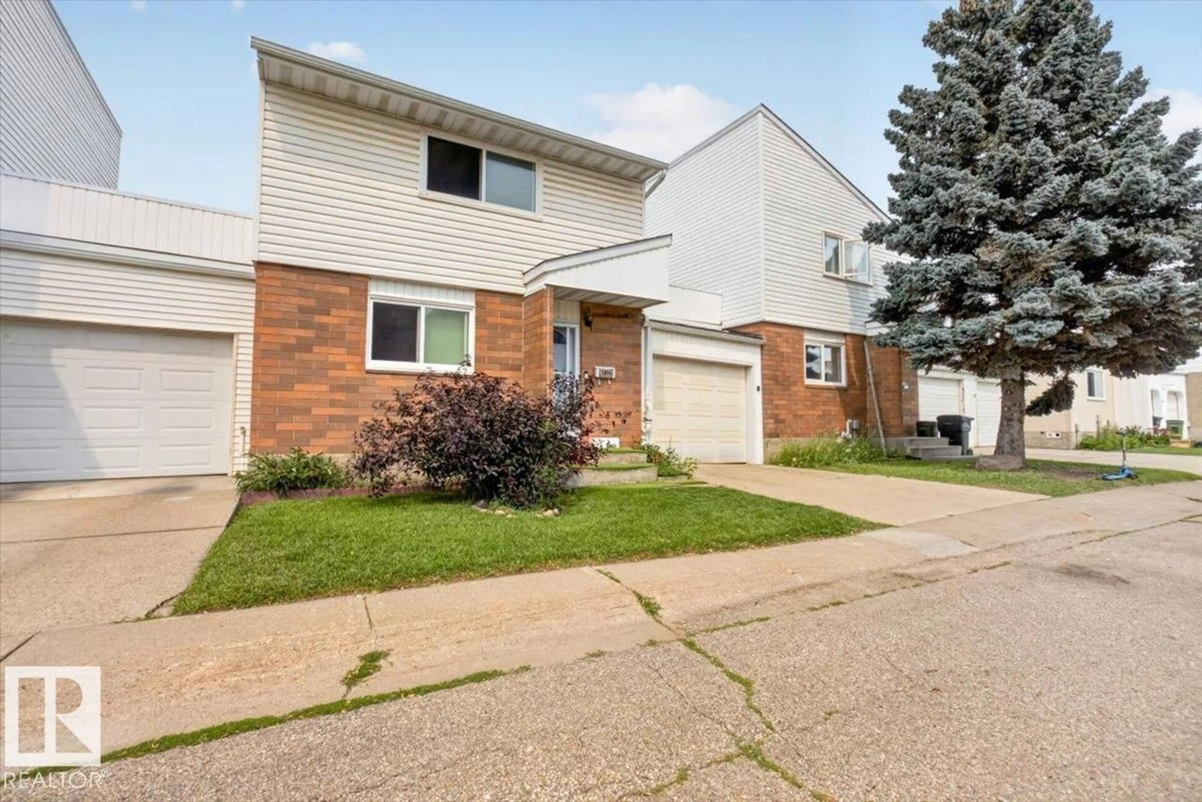 Home with brick exterior material, street for 1096 MILLBOURNE RD E NW, Edmonton Alberta T6K1W1