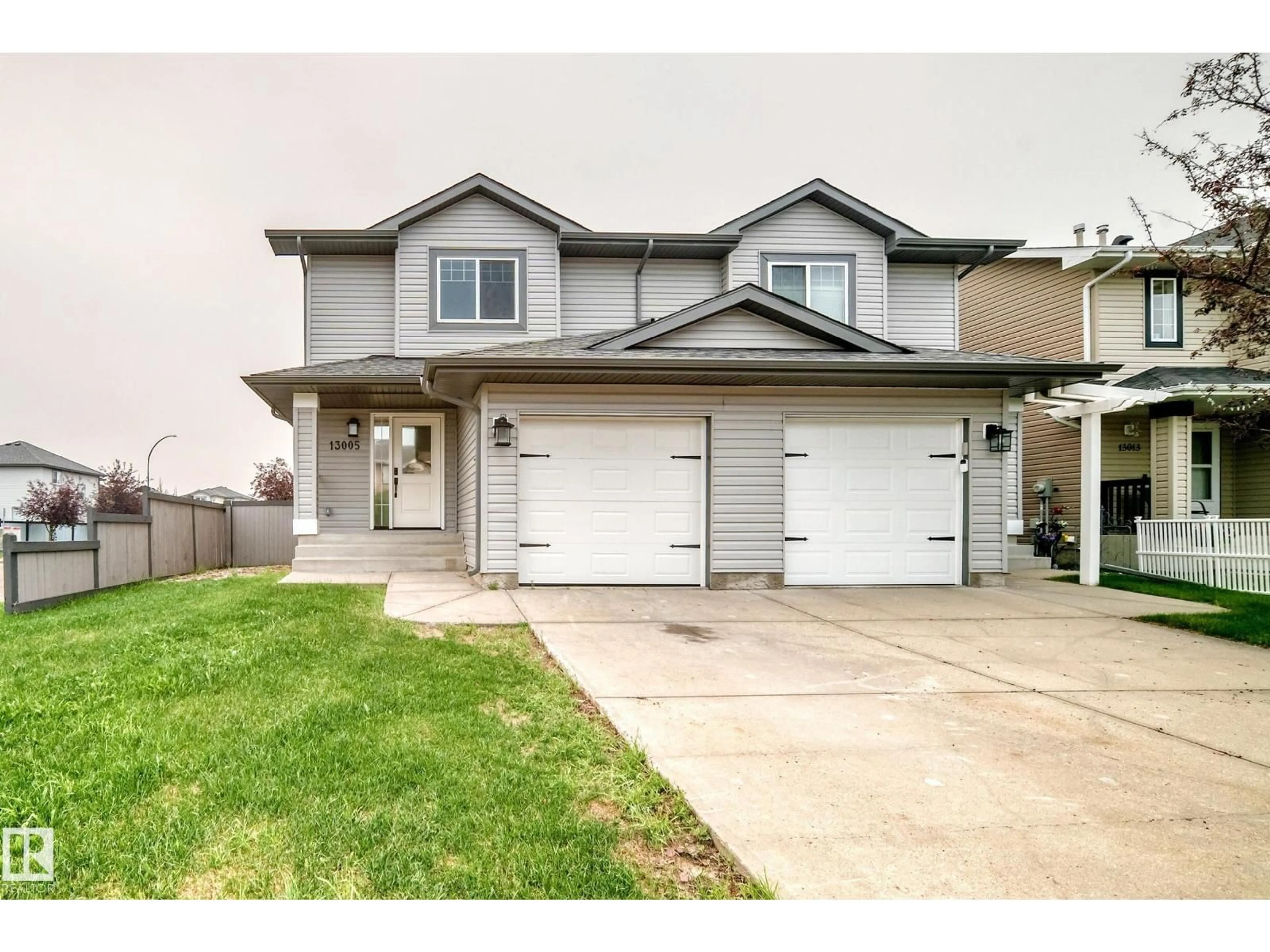 Home with vinyl exterior material, street for 13005 162A AV, Edmonton Alberta T6V1V5