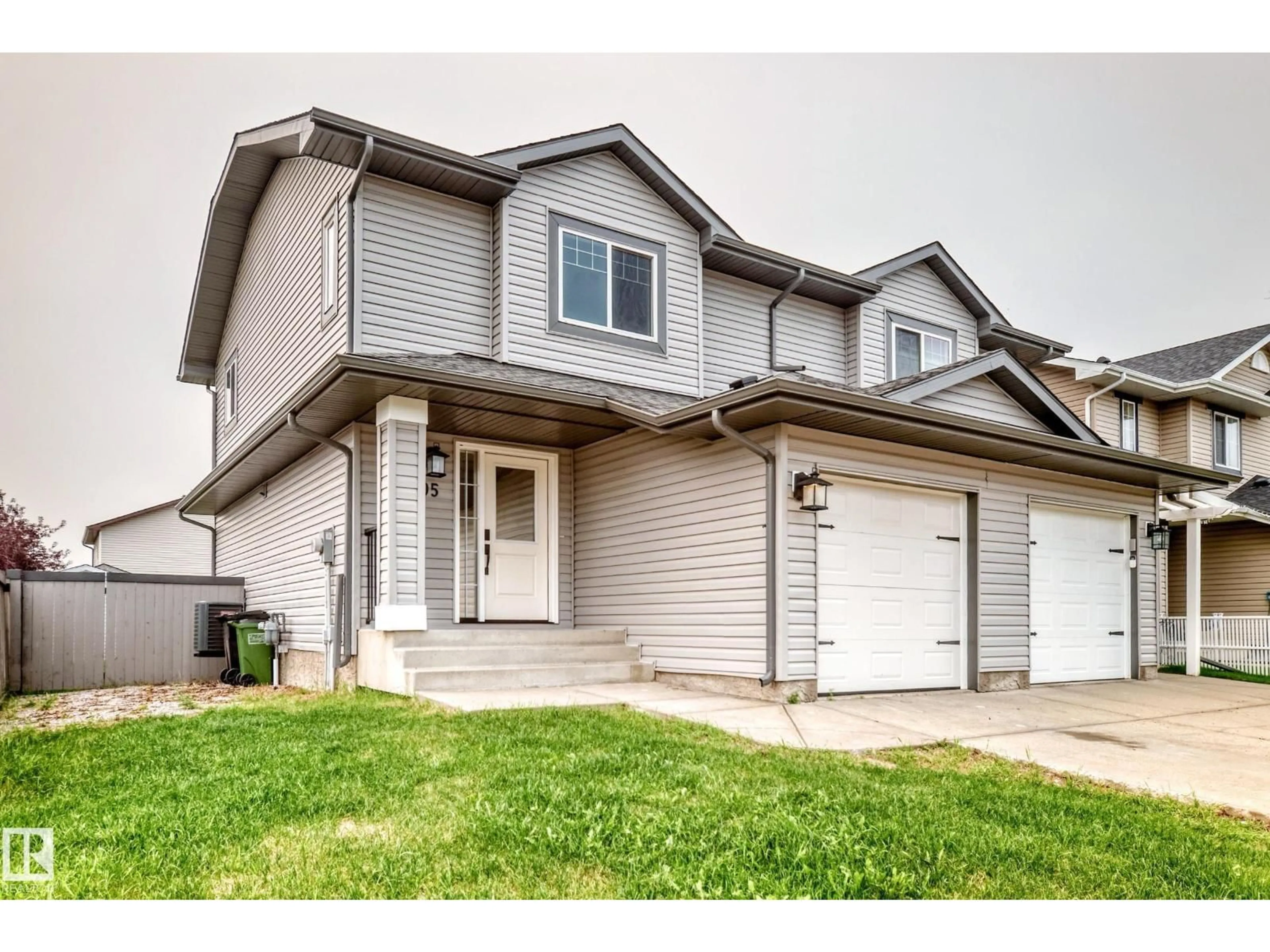 Home with vinyl exterior material, street for 13005 162A AV, Edmonton Alberta T6V1V5