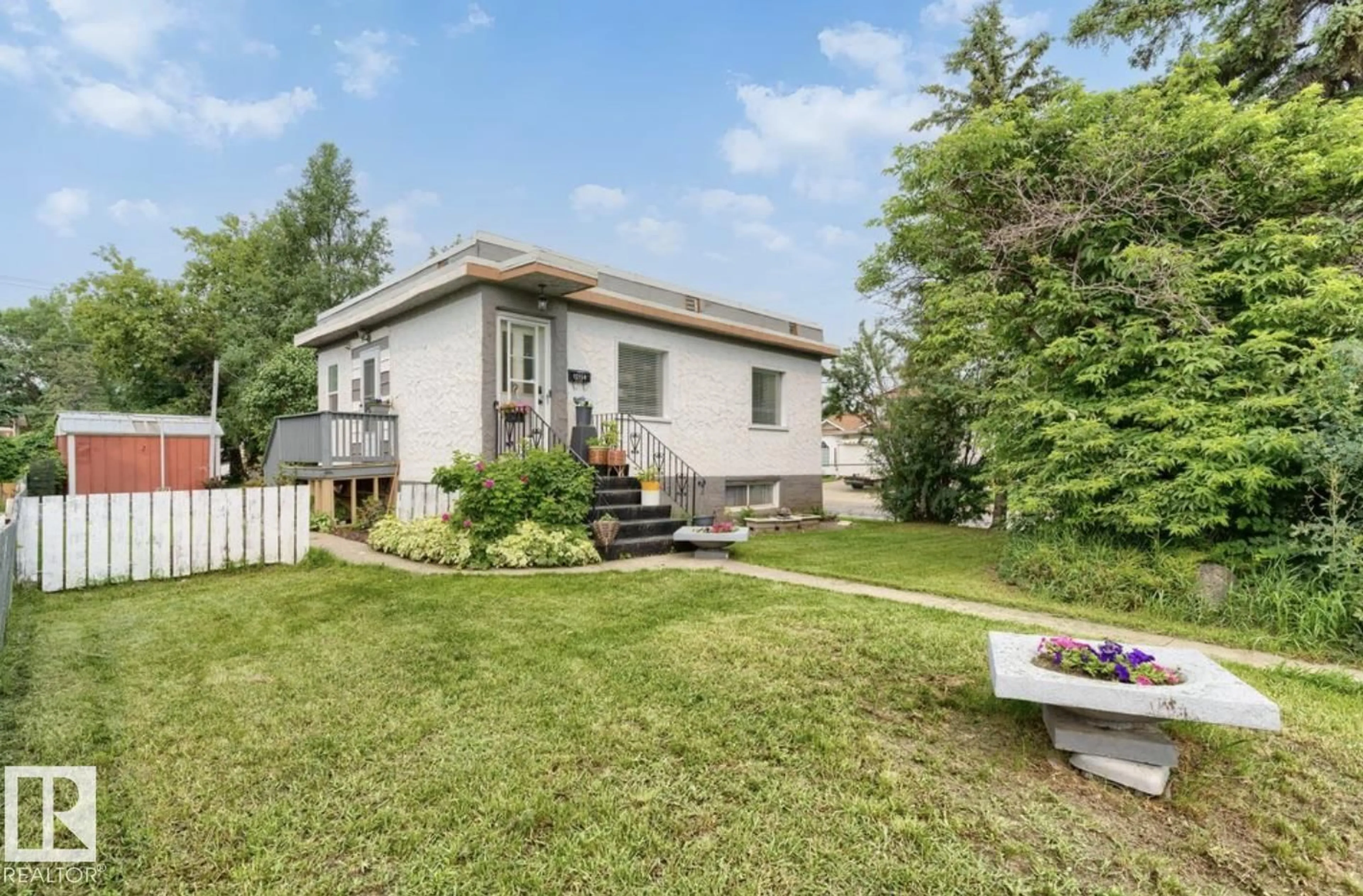 A pic from outside/outdoor area/front of a property/back of a property/a pic from drone, unknown for 12150 47 ST, Edmonton Alberta T5W2X5