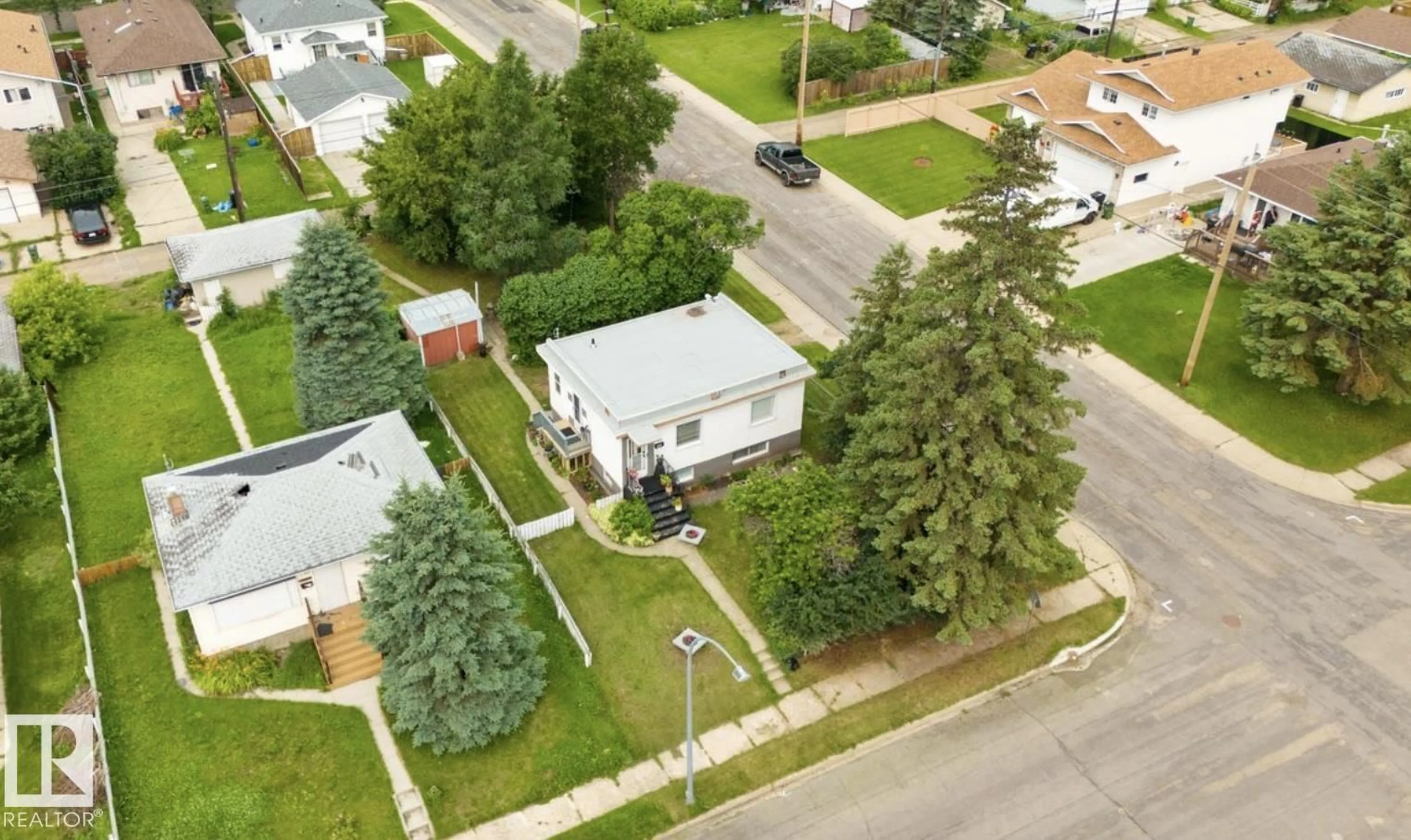 A pic from outside/outdoor area/front of a property/back of a property/a pic from drone, street for 12150 47 ST, Edmonton Alberta T5W2X5