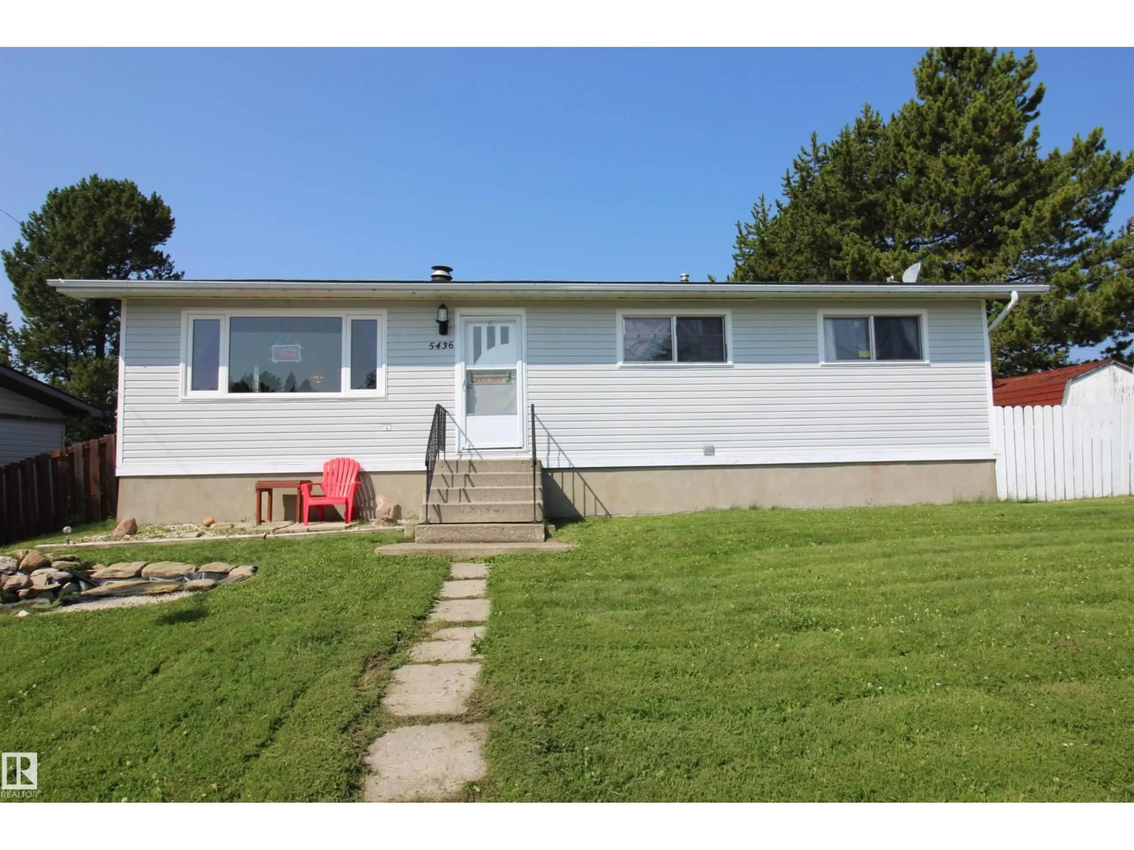 Home with vinyl exterior material, street for 5436 MOOSEHORN AV, Swan Hills Alberta T0G2C0