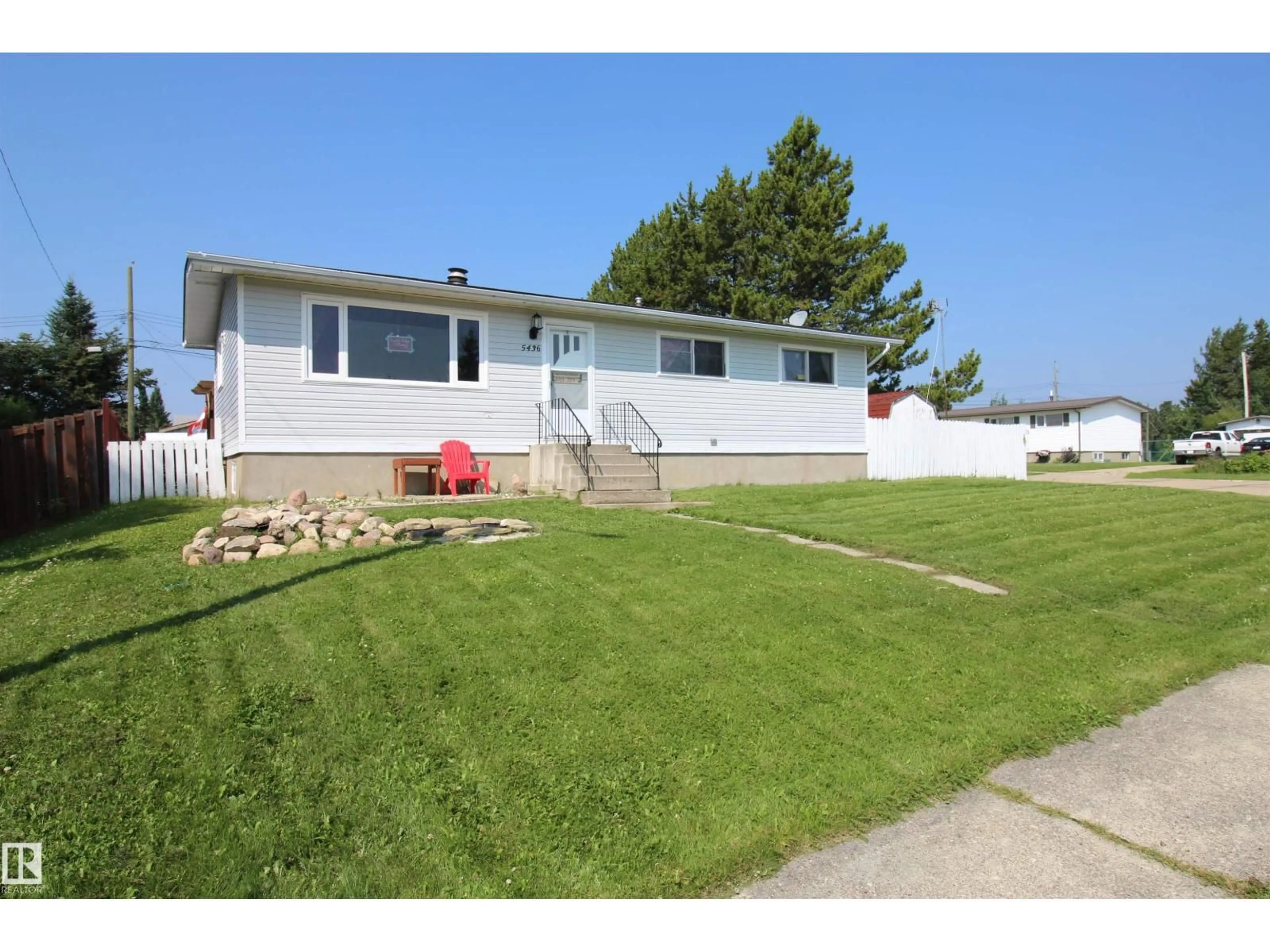 Home with vinyl exterior material, street for 5436 MOOSEHORN AV, Swan Hills Alberta T0G2C0