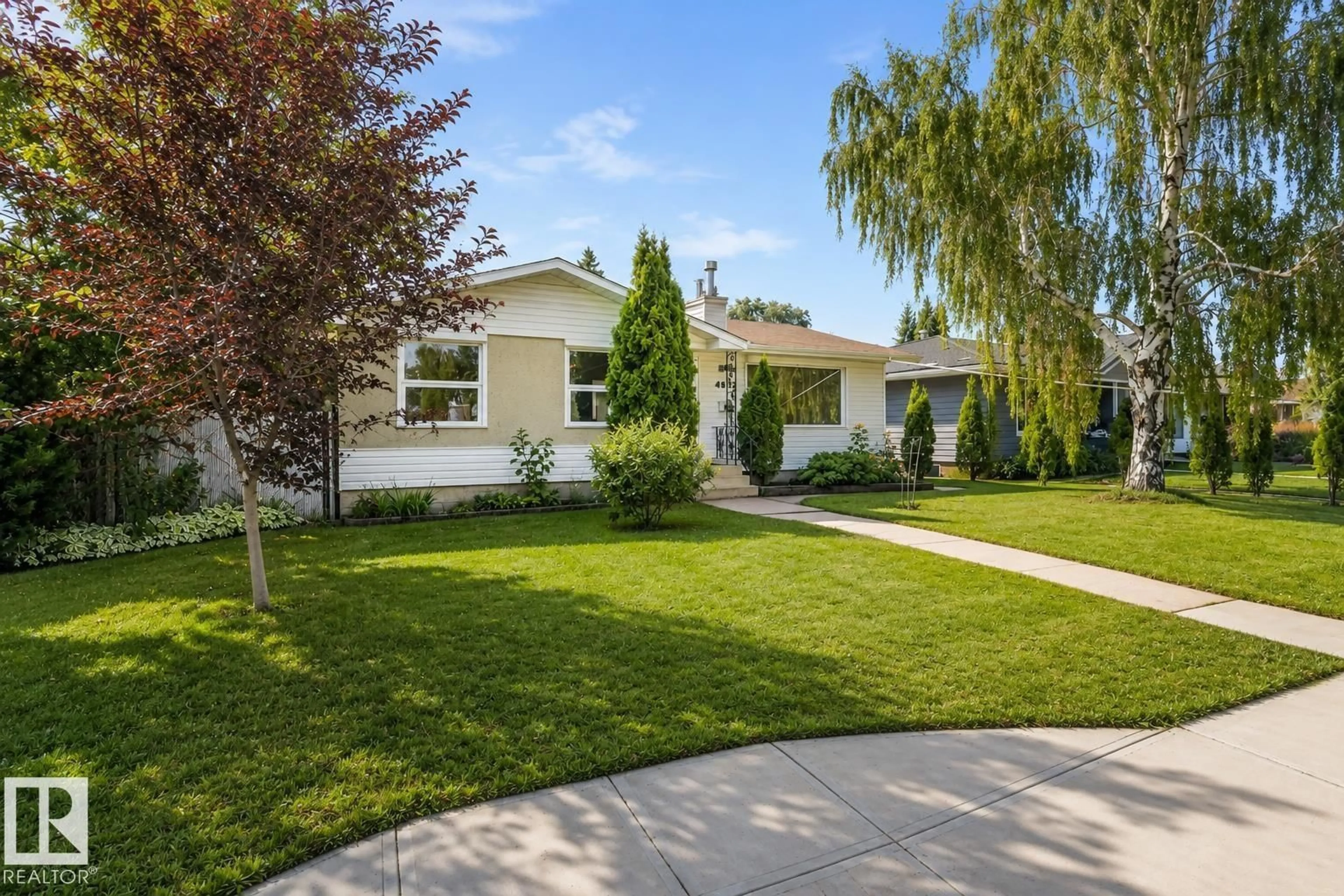 Home with vinyl exterior material, street for 4812 MALMO RD, Edmonton Alberta T6H4L6
