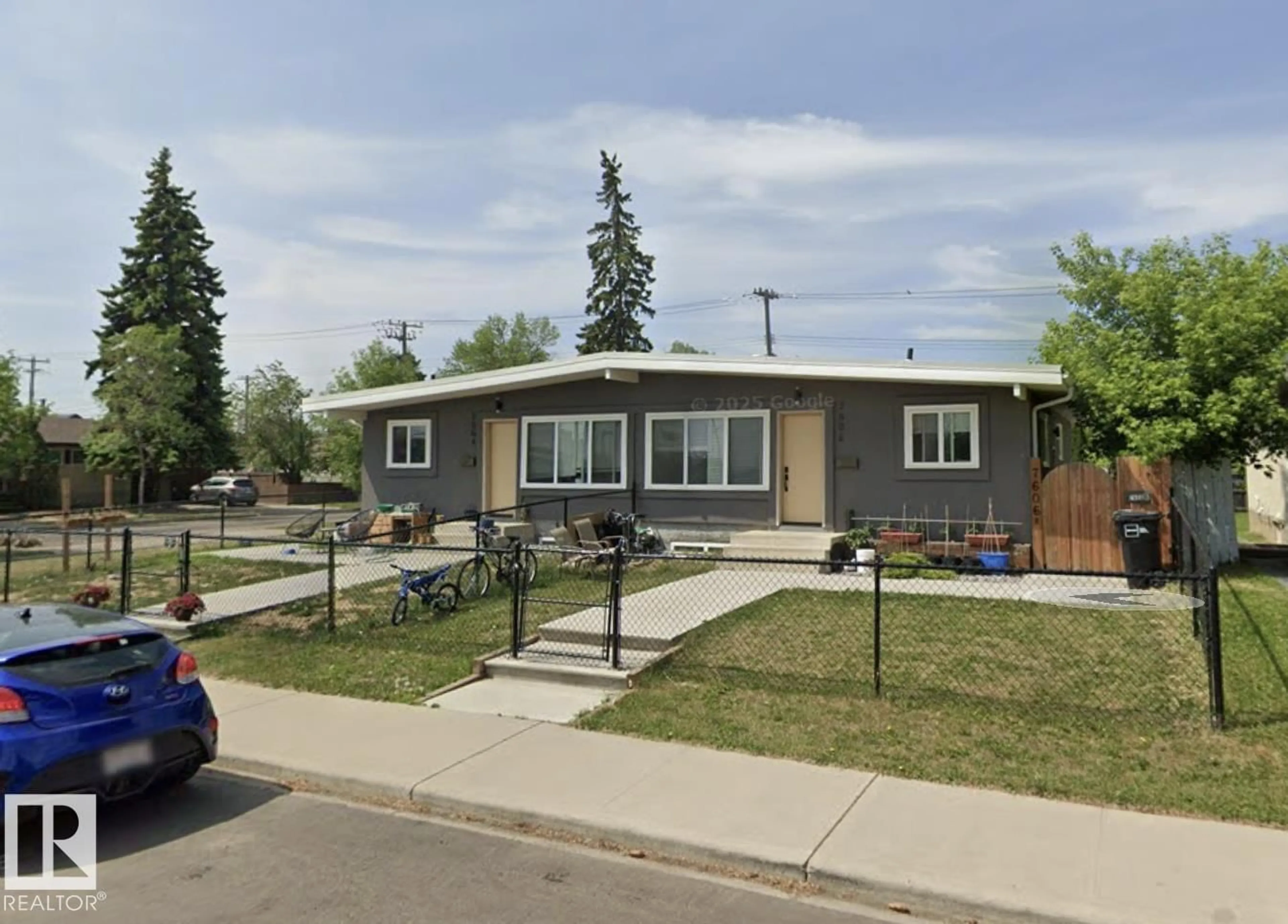 Home with vinyl exterior material, street for NW - 7604 7606 75 ST, Edmonton Alberta T6C2E9