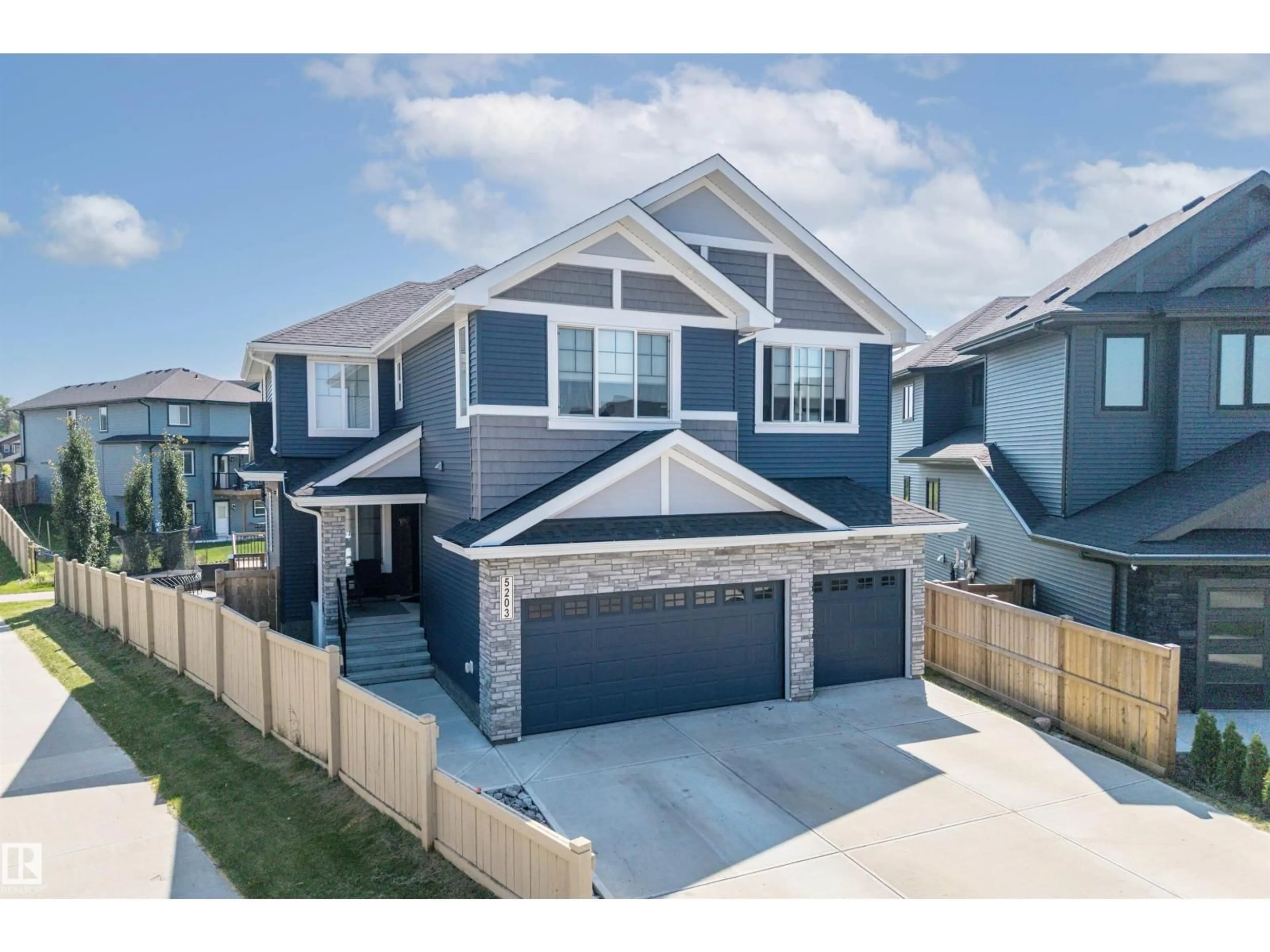 Home with vinyl exterior material, street for SW - 5203 23A AV, Edmonton Alberta T6X2X3