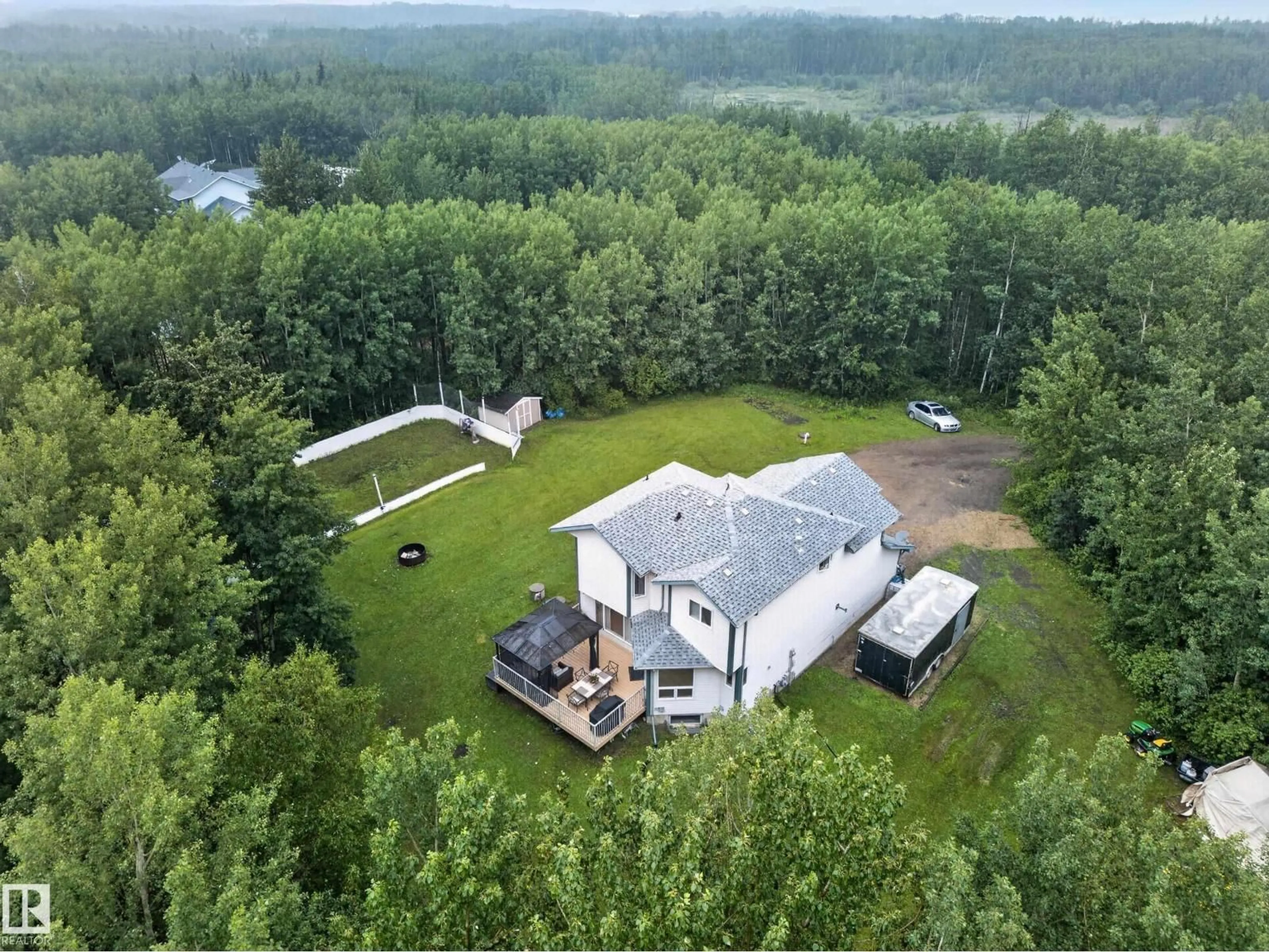 A pic from outside/outdoor area/front of a property/back of a property/a pic from drone, water/lake/river/ocean view for 217 - 51058 RGE ROAD 212, Rural Strathcona County Alberta T8G1E7