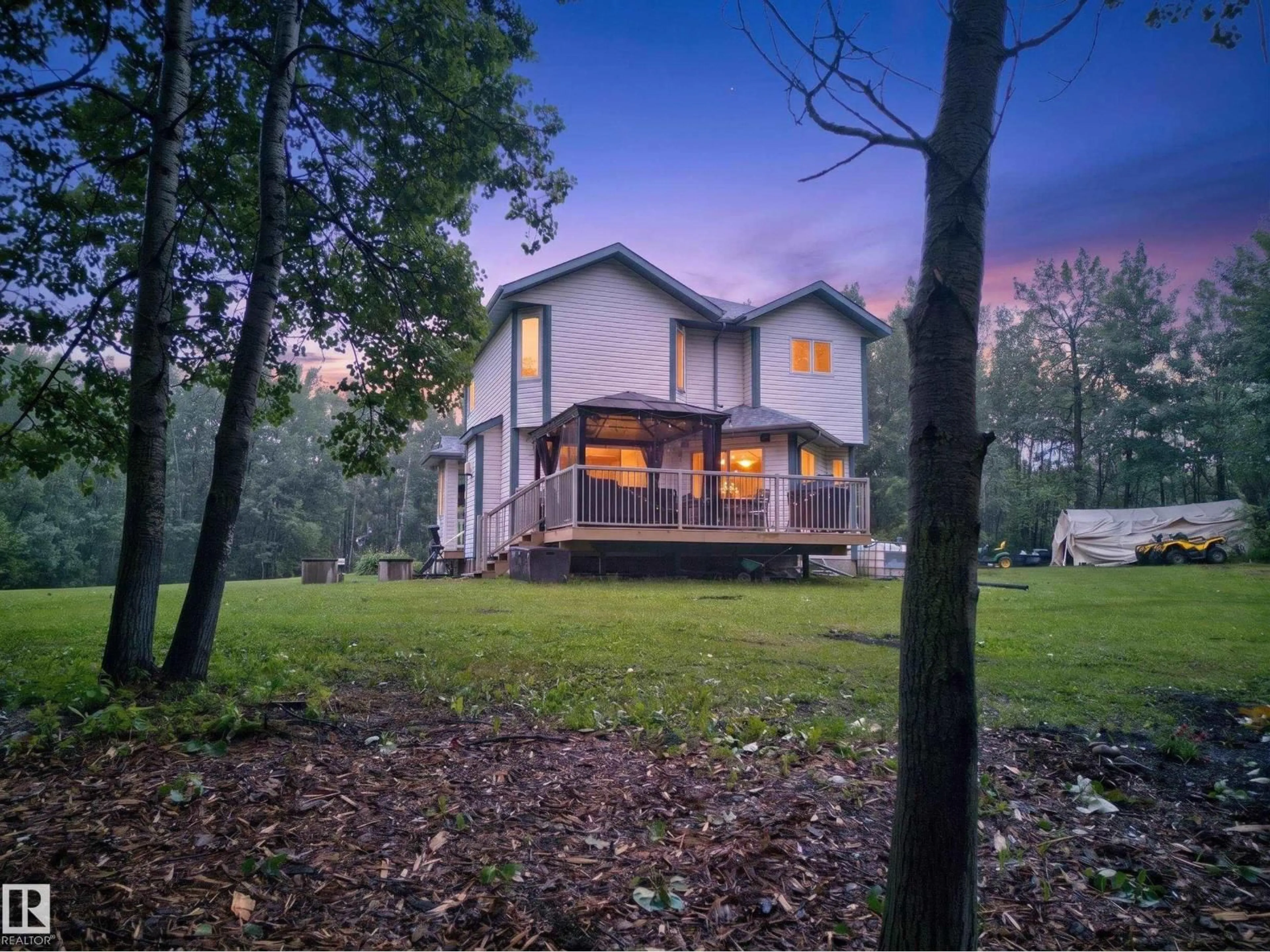 A pic from outside/outdoor area/front of a property/back of a property/a pic from drone, forest/trees view for 217 - 51058 RGE ROAD 212, Rural Strathcona County Alberta T8G1E7