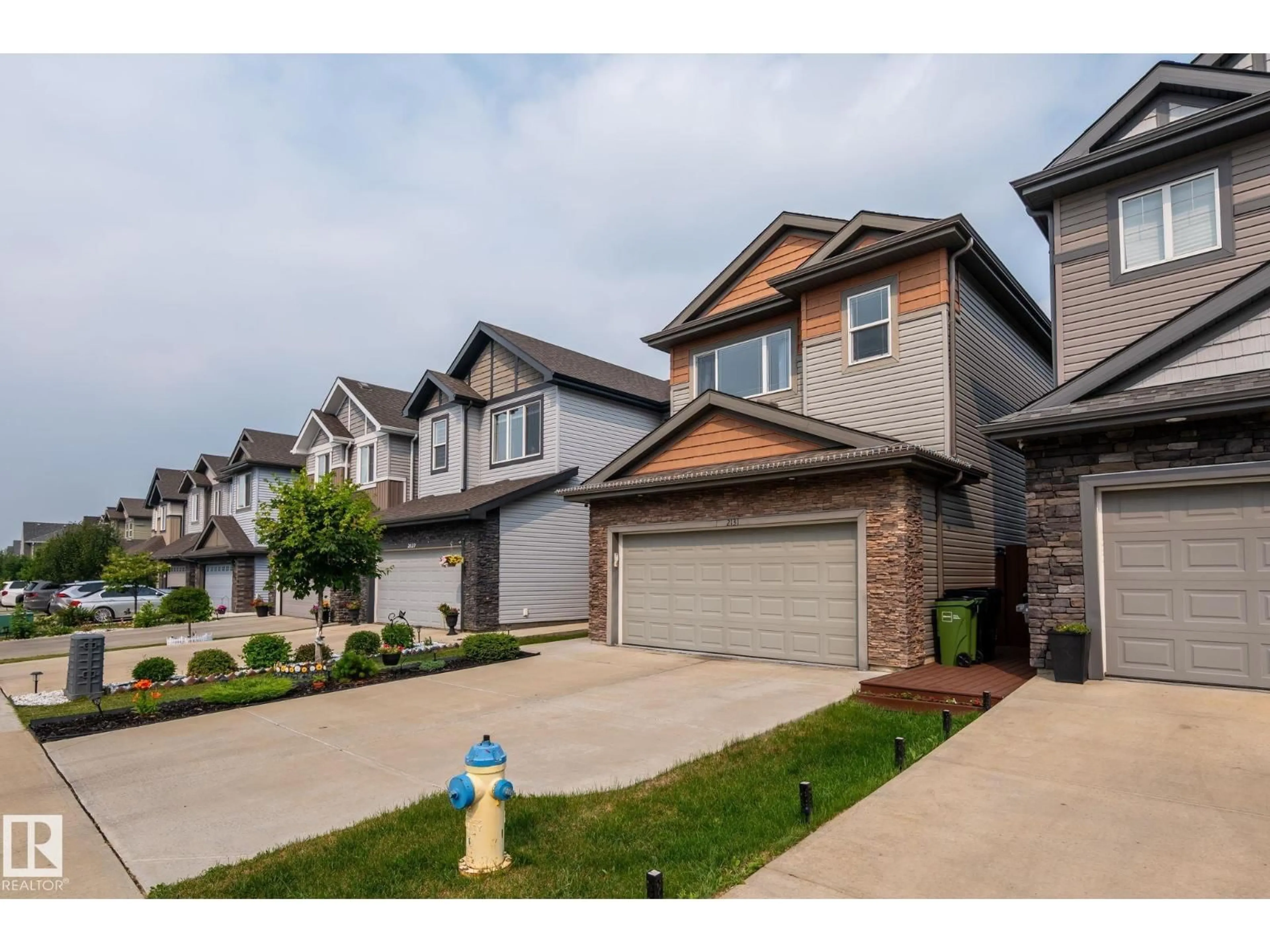 A pic from outside/outdoor area/front of a property/back of a property/a pic from drone, street for 2131 51 SW, Edmonton Alberta T6T1M1