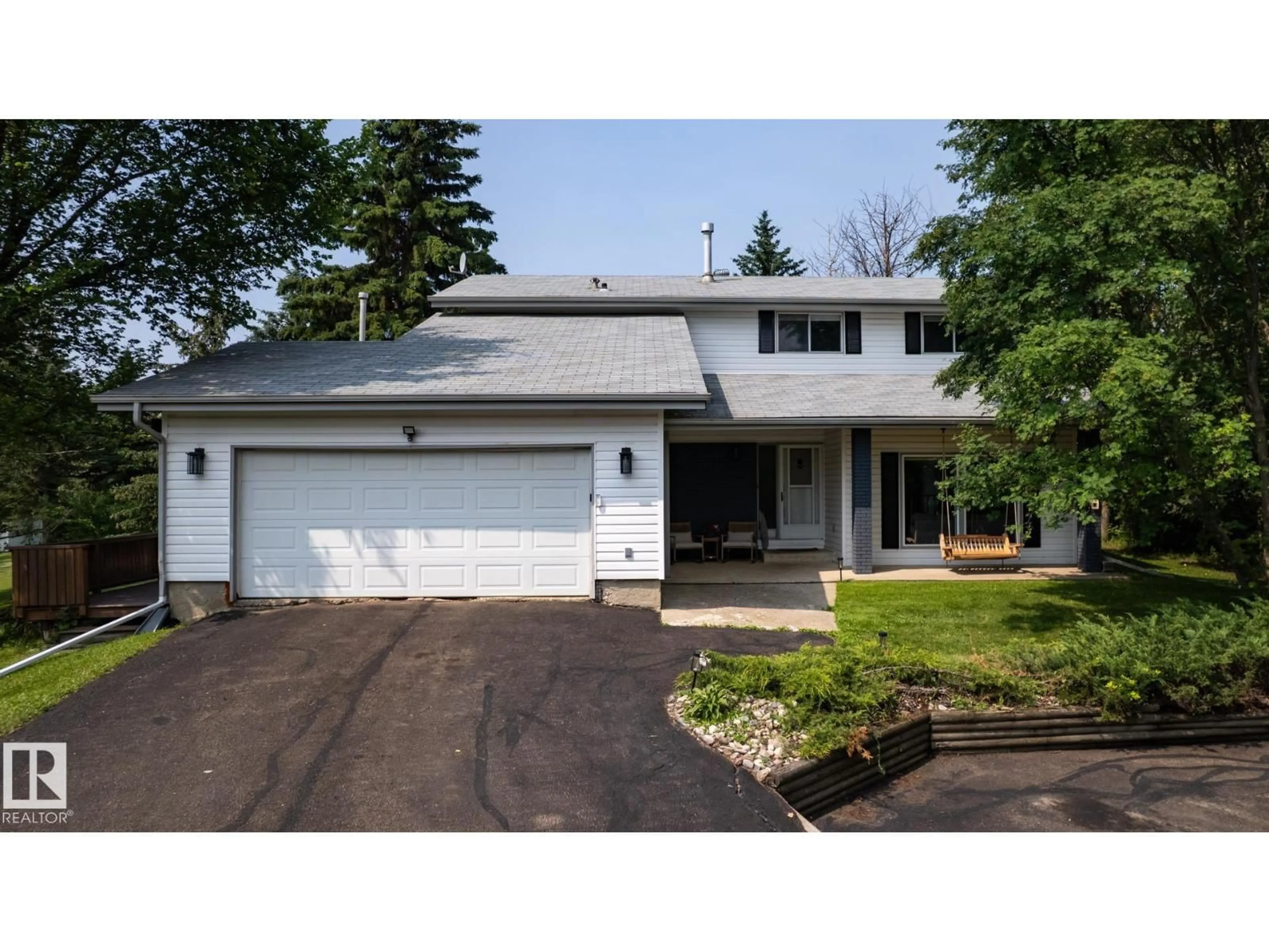Home with vinyl exterior material, street for 52548 - 229 RGE ROAD 223, Rural Strathcona County Alberta T8A4R3