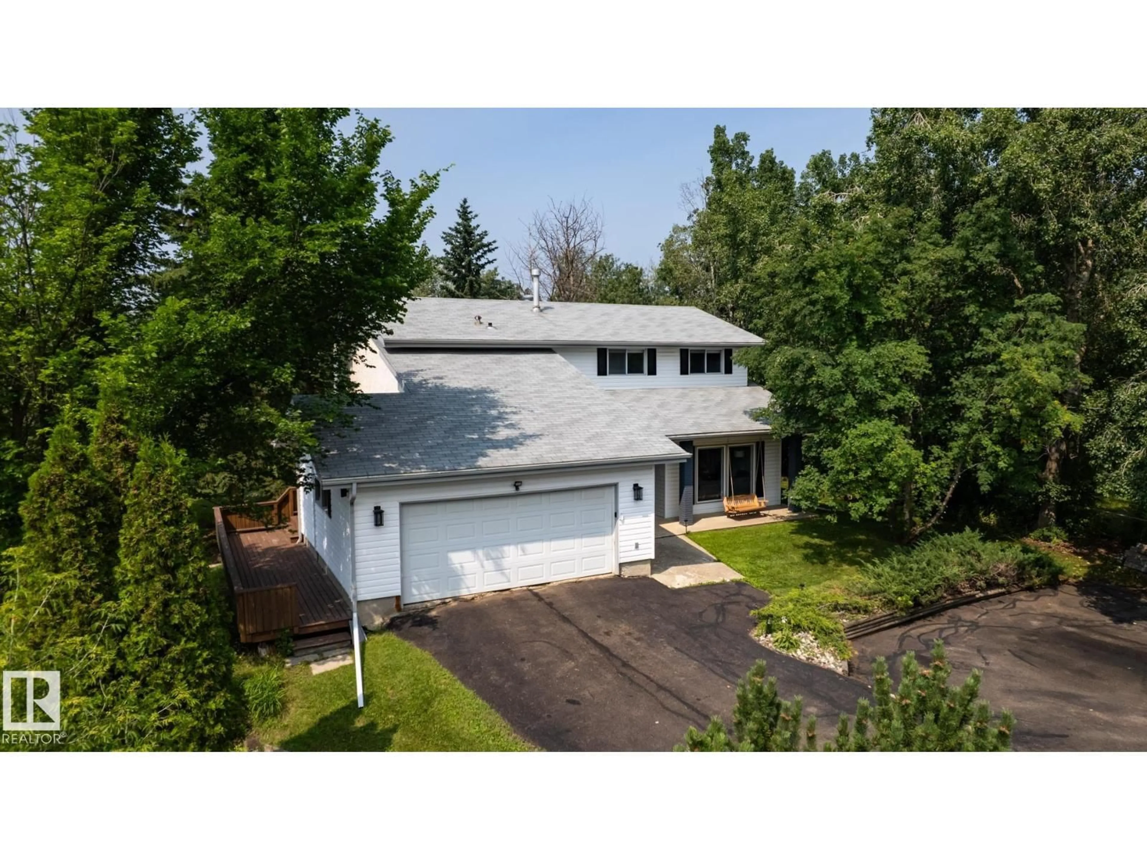 A pic from outside/outdoor area/front of a property/back of a property/a pic from drone, street for 52548 - 229 RGE ROAD 223, Rural Strathcona County Alberta T8A4R3