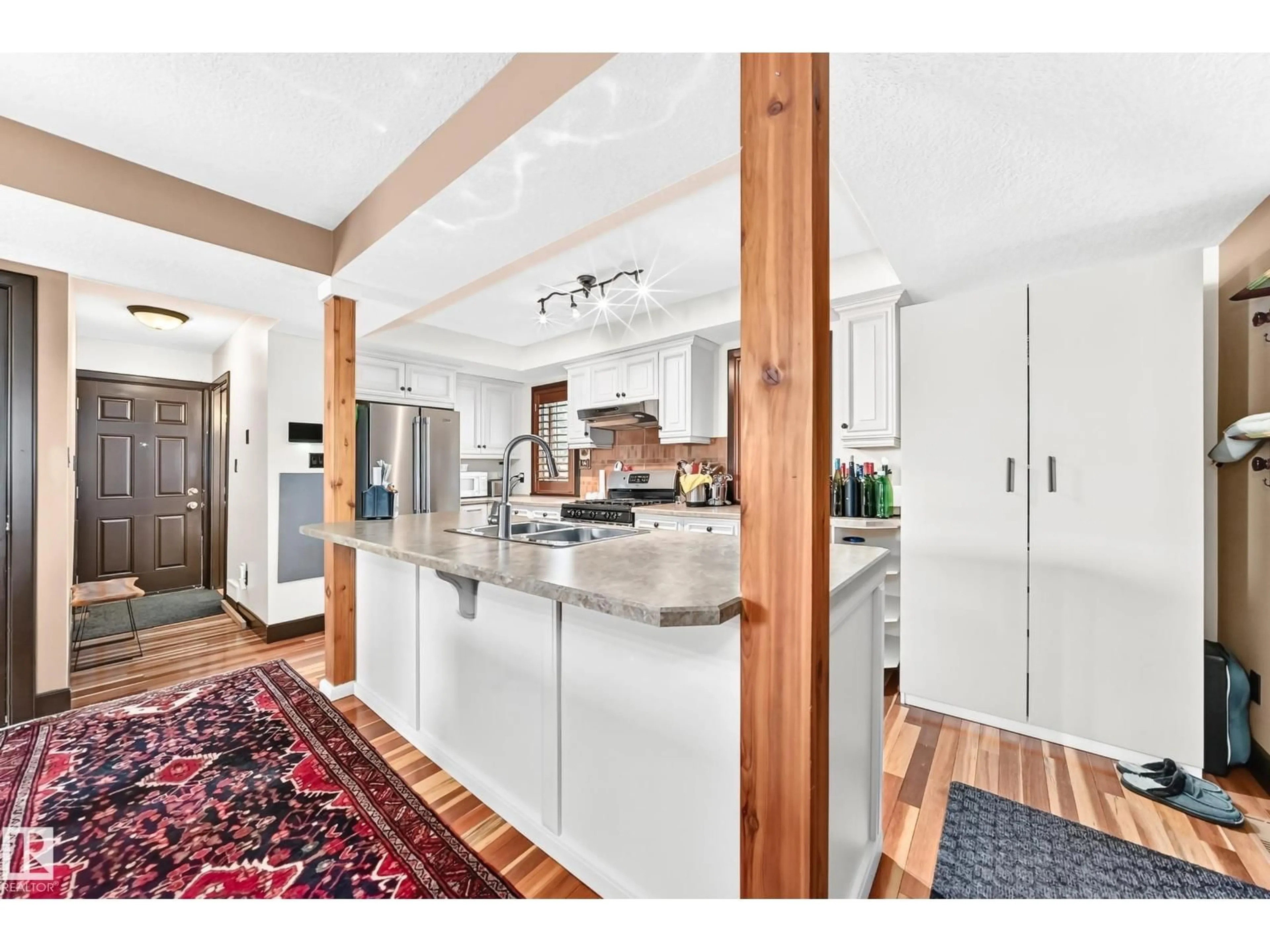 Open concept kitchen, unknown for NW - 12211 107 ST, Edmonton Alberta T5G2S9