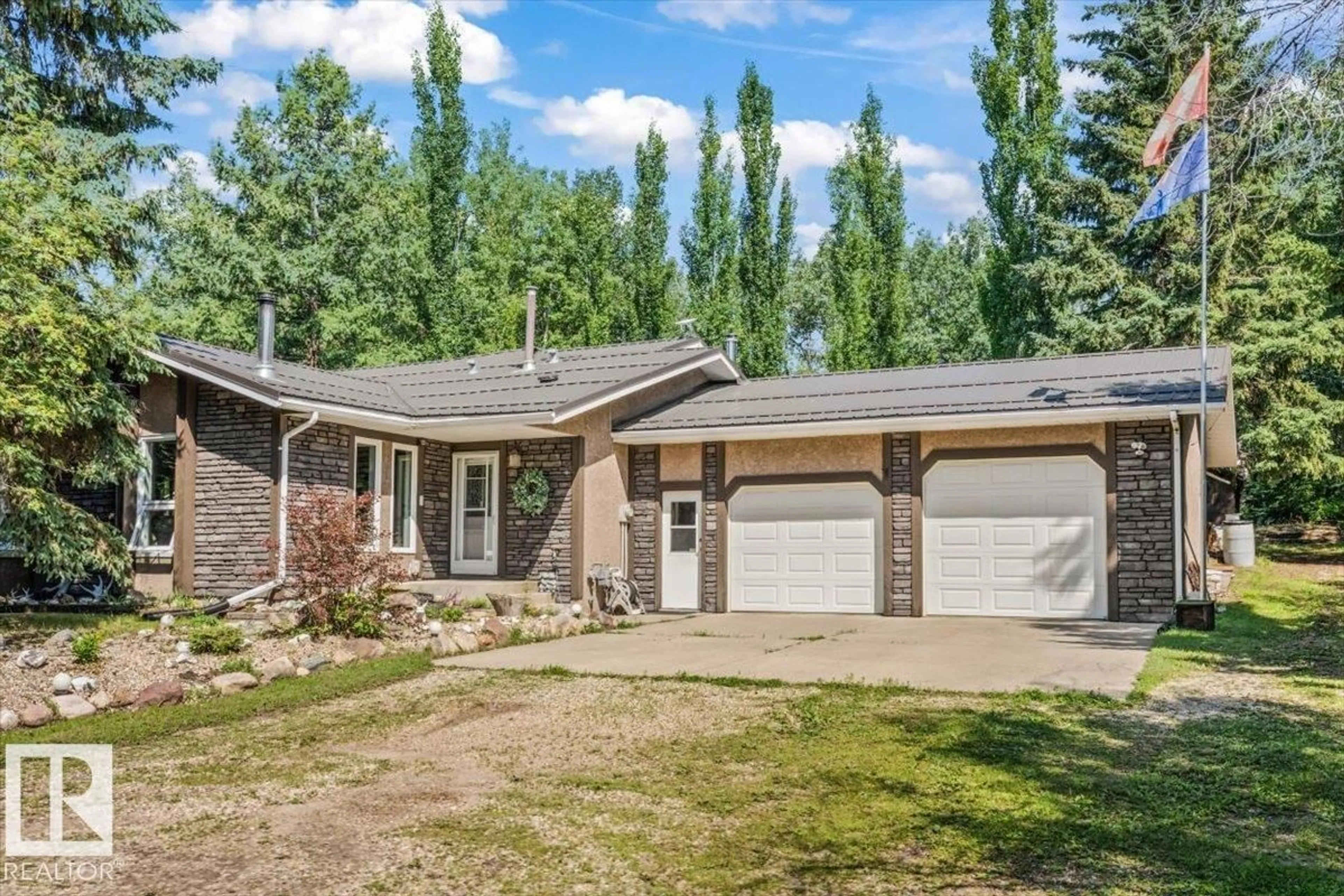 Home with vinyl exterior material, street for 42 - 54129 RGE ROAD 275, Rural Parkland County Alberta T7X3S4