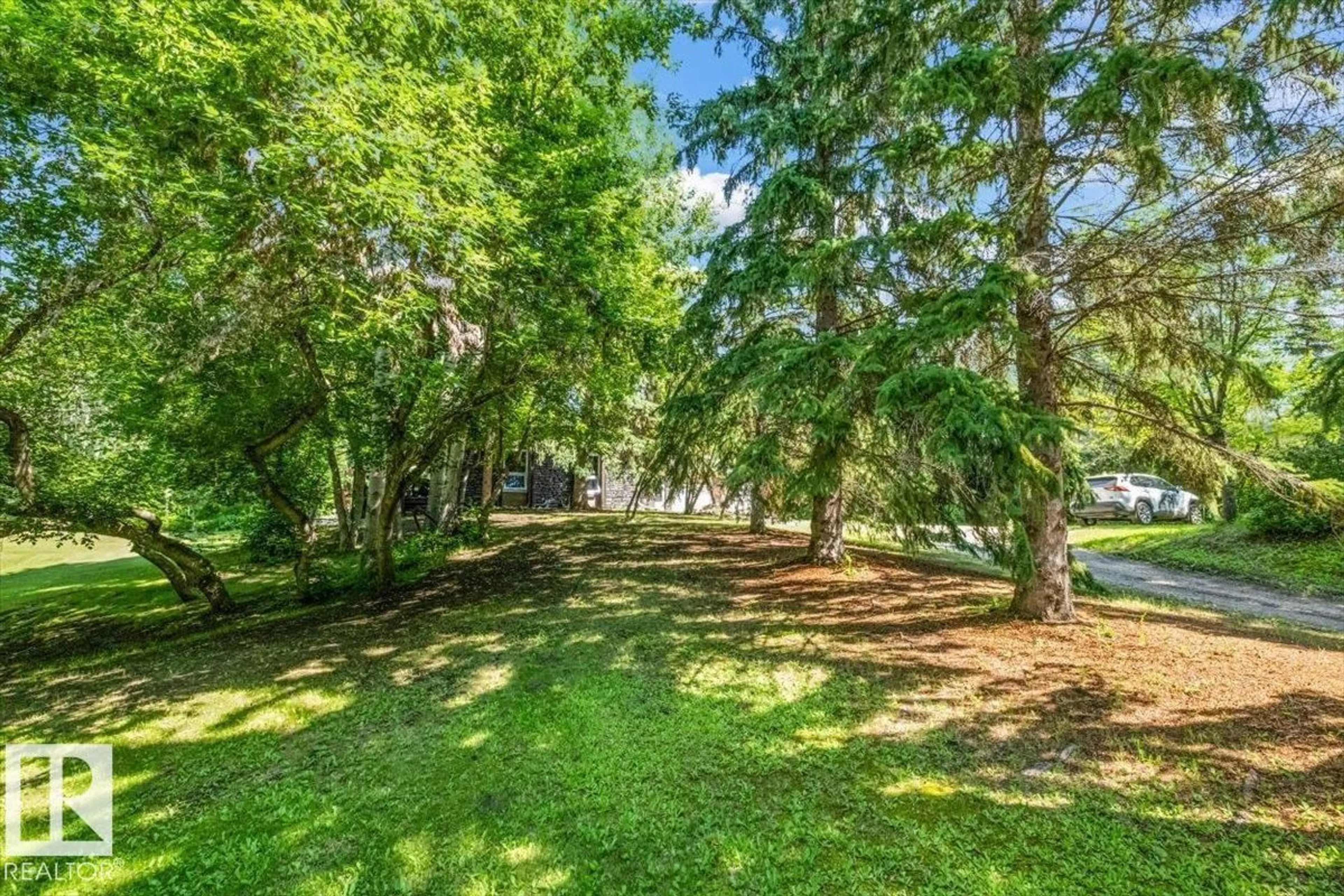 Patio, forest/trees view for 42 - 54129 RGE ROAD 275, Rural Parkland County Alberta T7X3S4