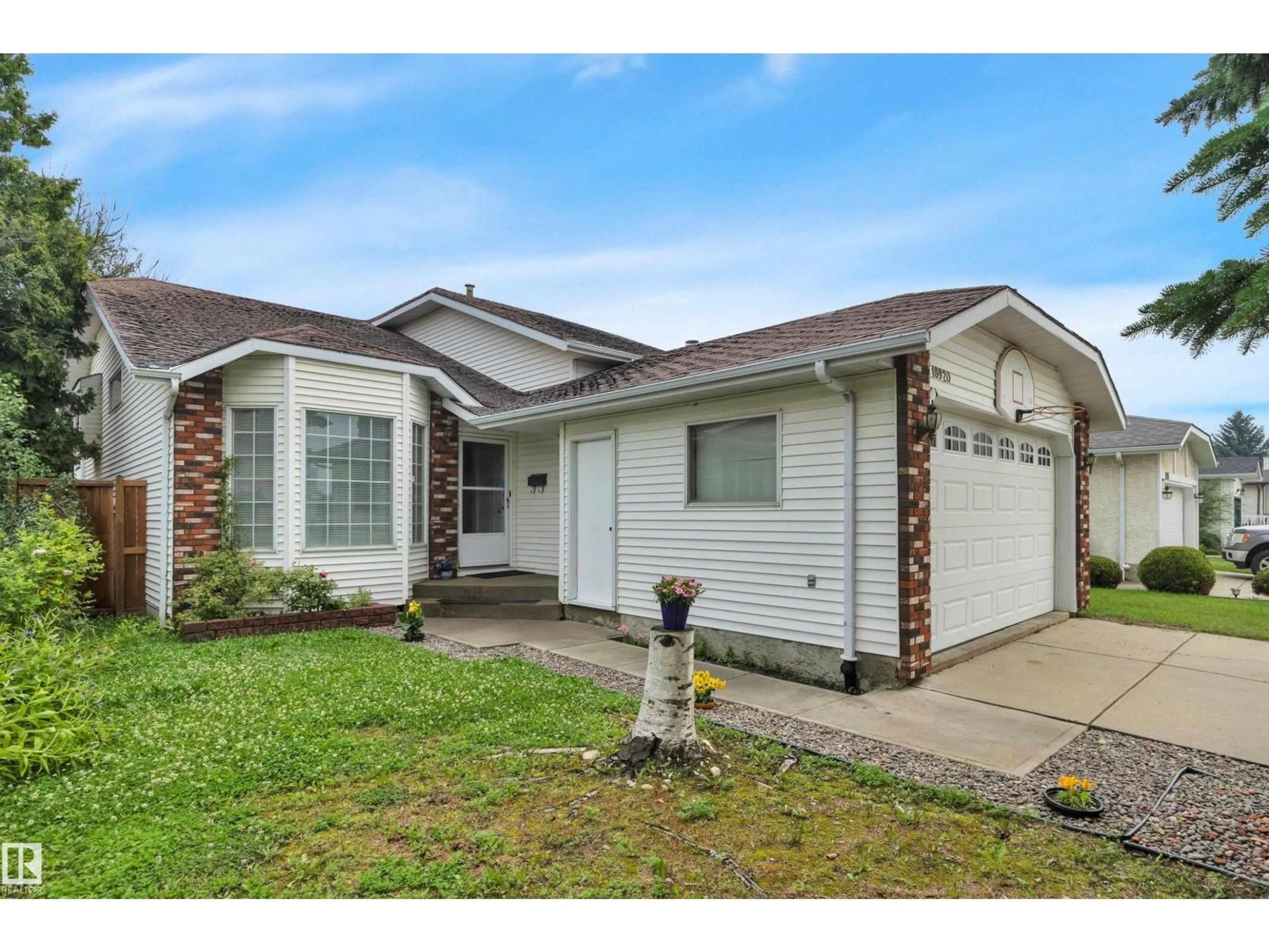 Home with vinyl exterior material, street for 18920 78 AV, Edmonton Alberta T5T5H8