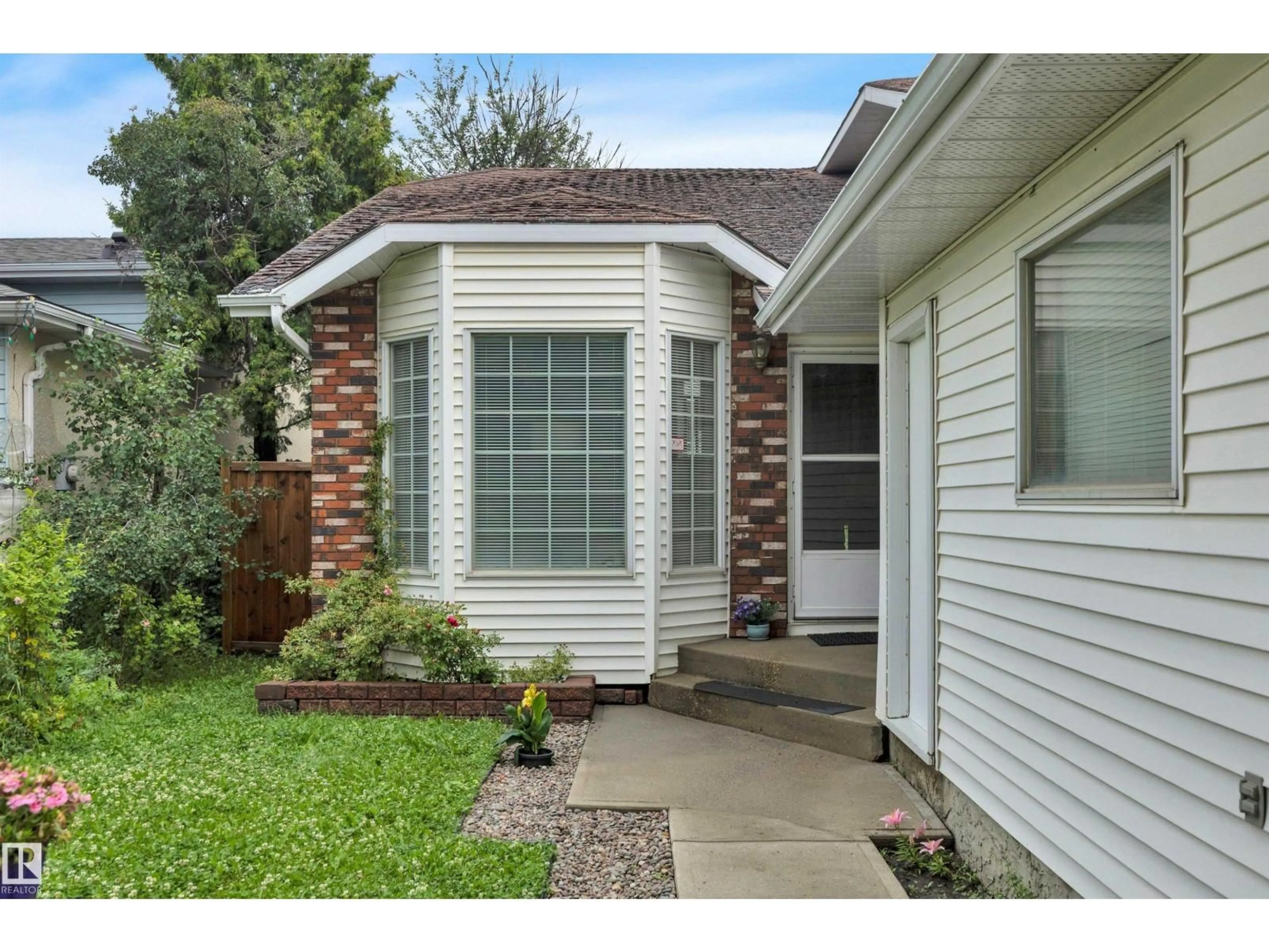 Home with vinyl exterior material, street for 18920 78 AV, Edmonton Alberta T5T5H8