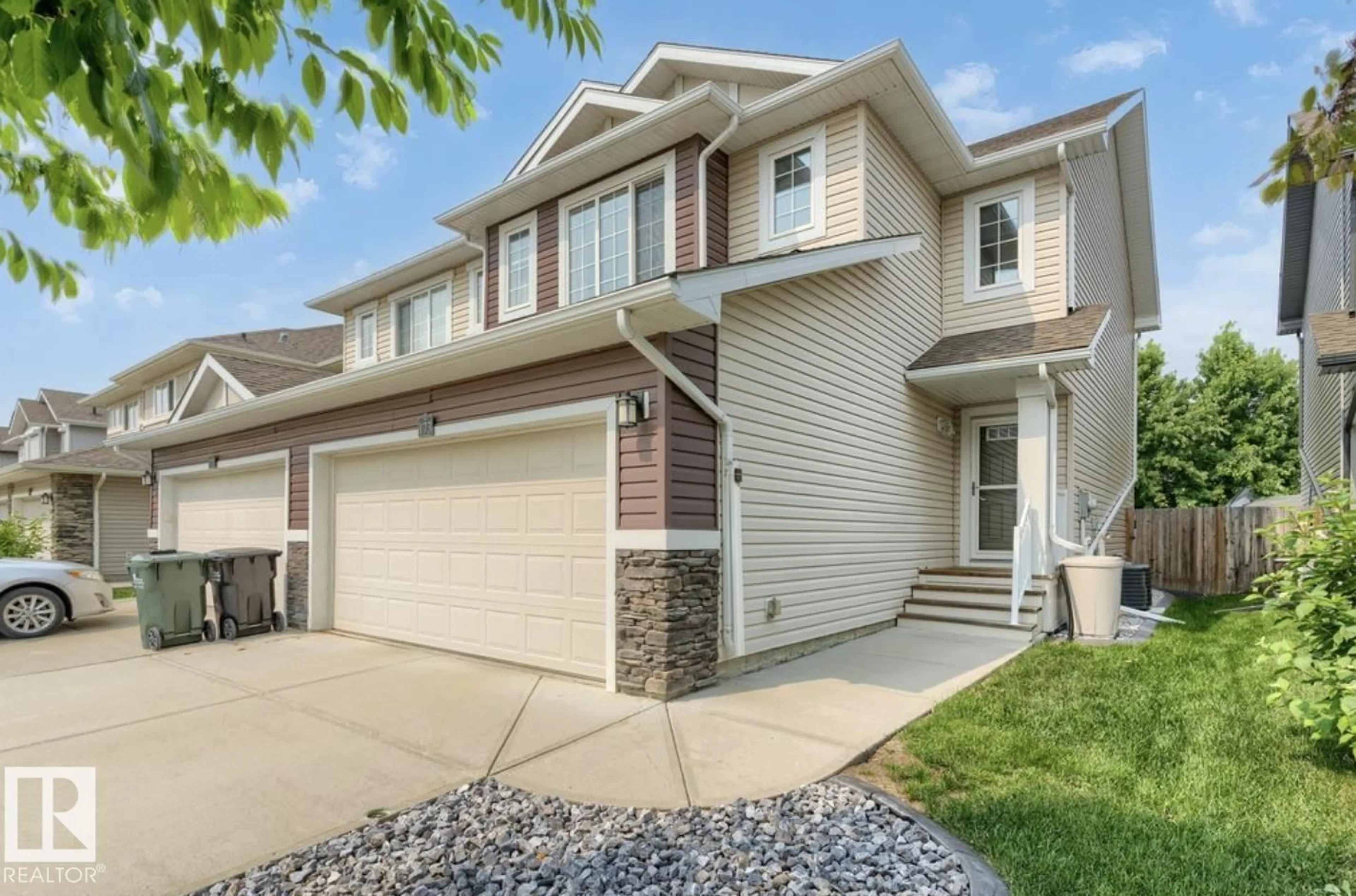 Home with vinyl exterior material, street for 173 SUNTERRA WY, Sherwood Park Alberta T8H0T9