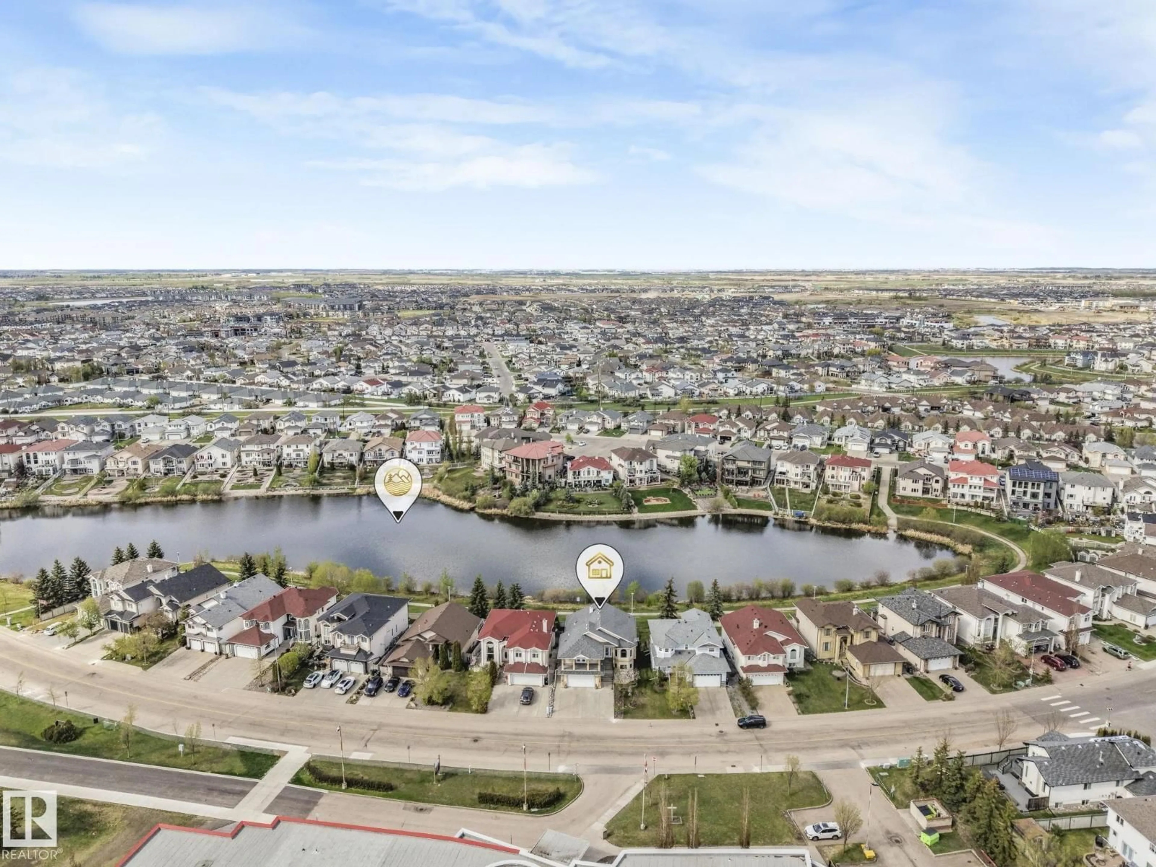 A pic from outside/outdoor area/front of a property/back of a property/a pic from drone, water/lake/river/ocean view for 7504 161A AV, Edmonton Alberta T5Z3S9