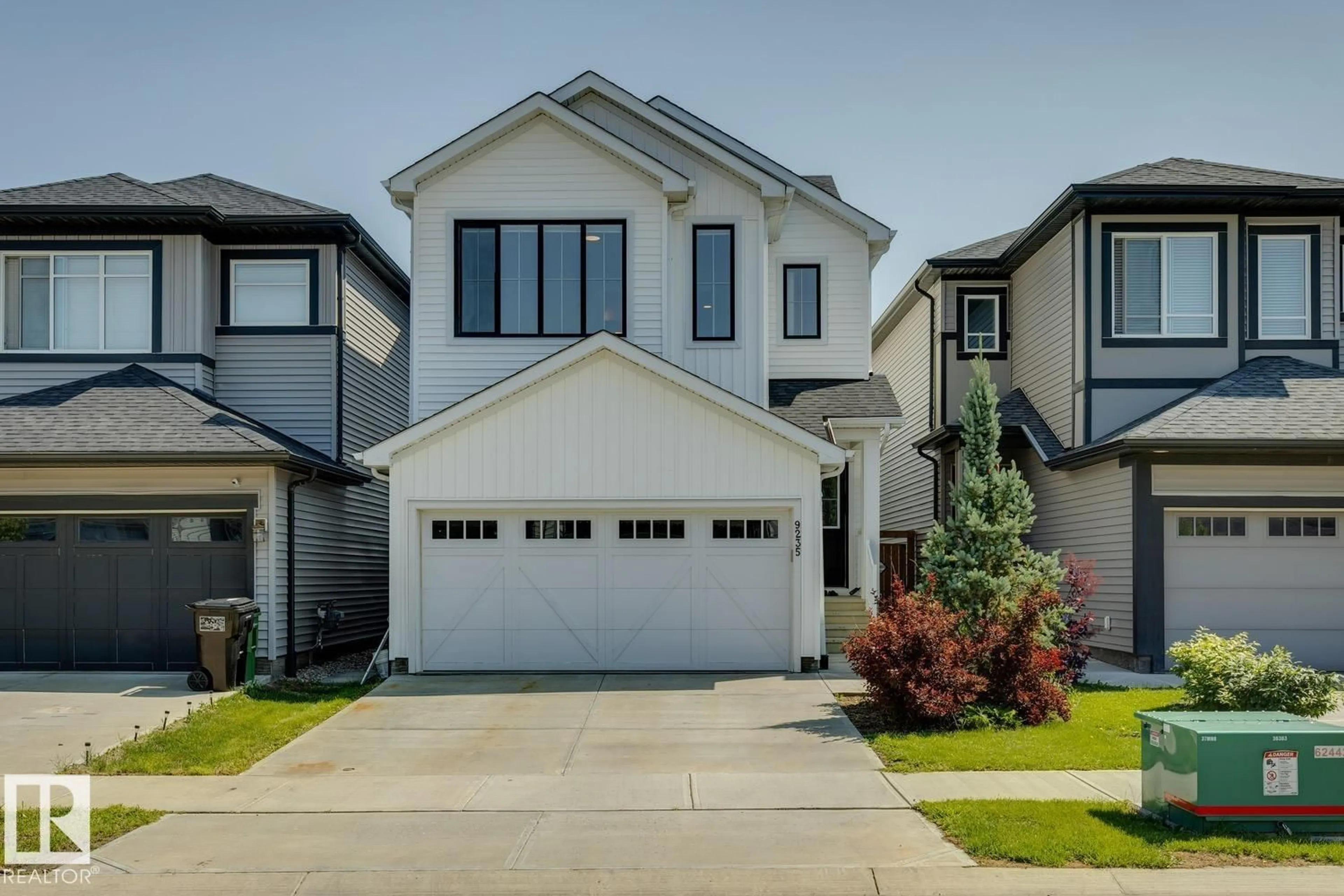 Home with vinyl exterior material, street for NW - 9235 223 ST, Edmonton Alberta T5T7M1