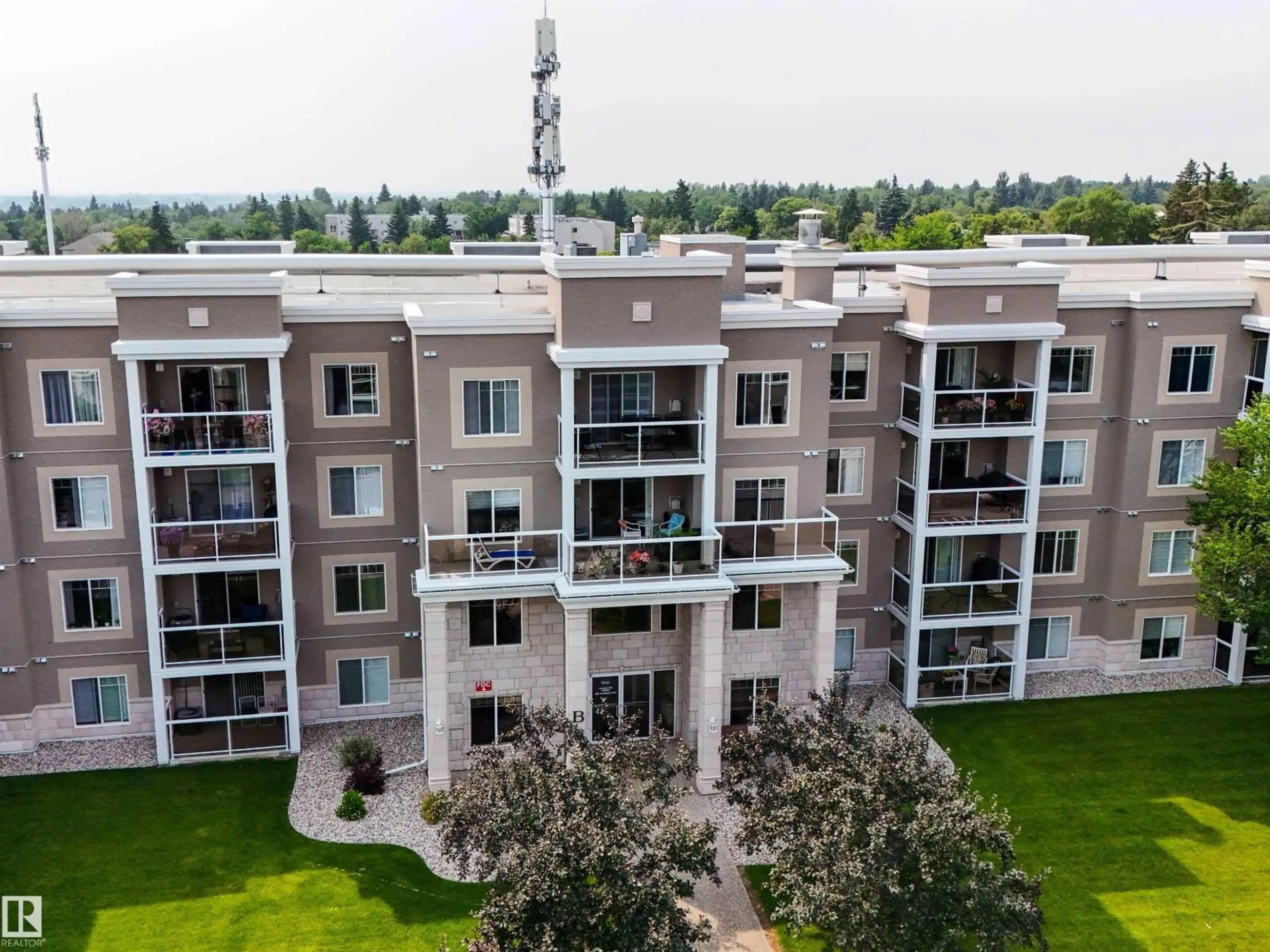 A pic from outside/outdoor area/front of a property/back of a property/a pic from drone, unknown for 78B - 140 MCKENNEY AV, St. Albert Alberta T8N7K3