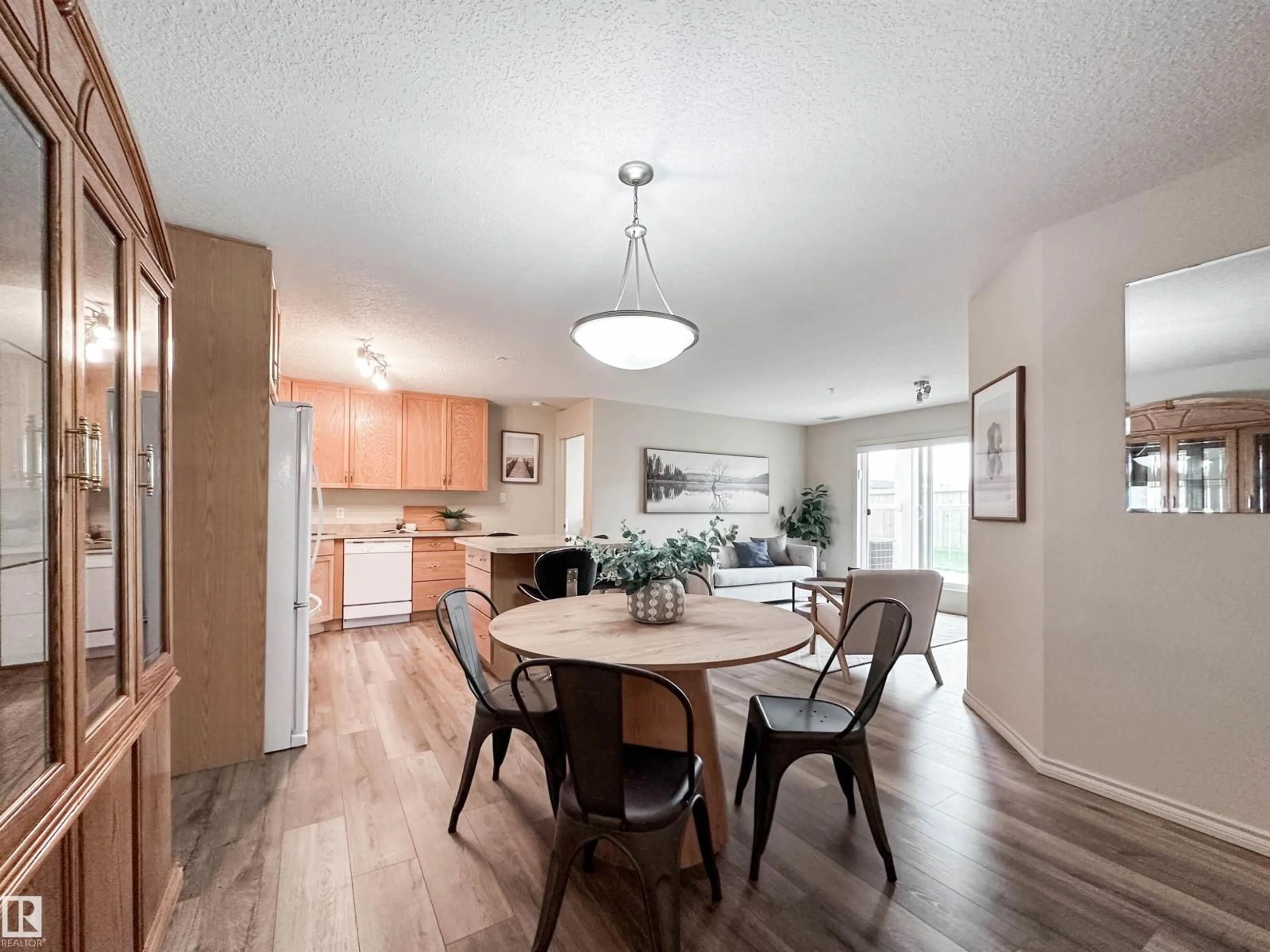Dining room, wood/laminate floor for 78B - 140 MCKENNEY AV, St. Albert Alberta T8N7K3