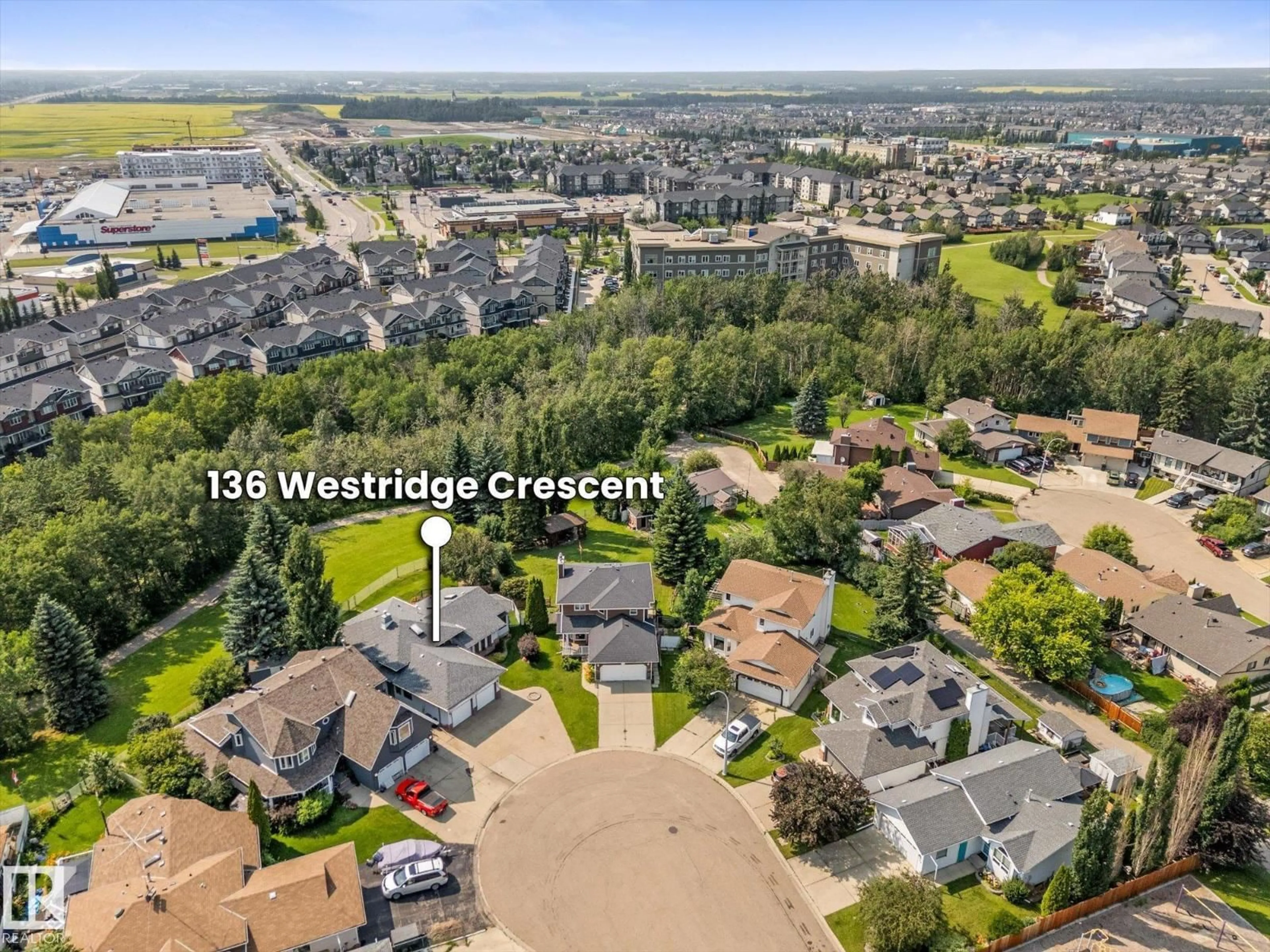 A pic from outside/outdoor area/front of a property/back of a property/a pic from drone, water/lake/river/ocean view for 136 WESTRIDGE CR, Spruce Grove Alberta T7X3C8