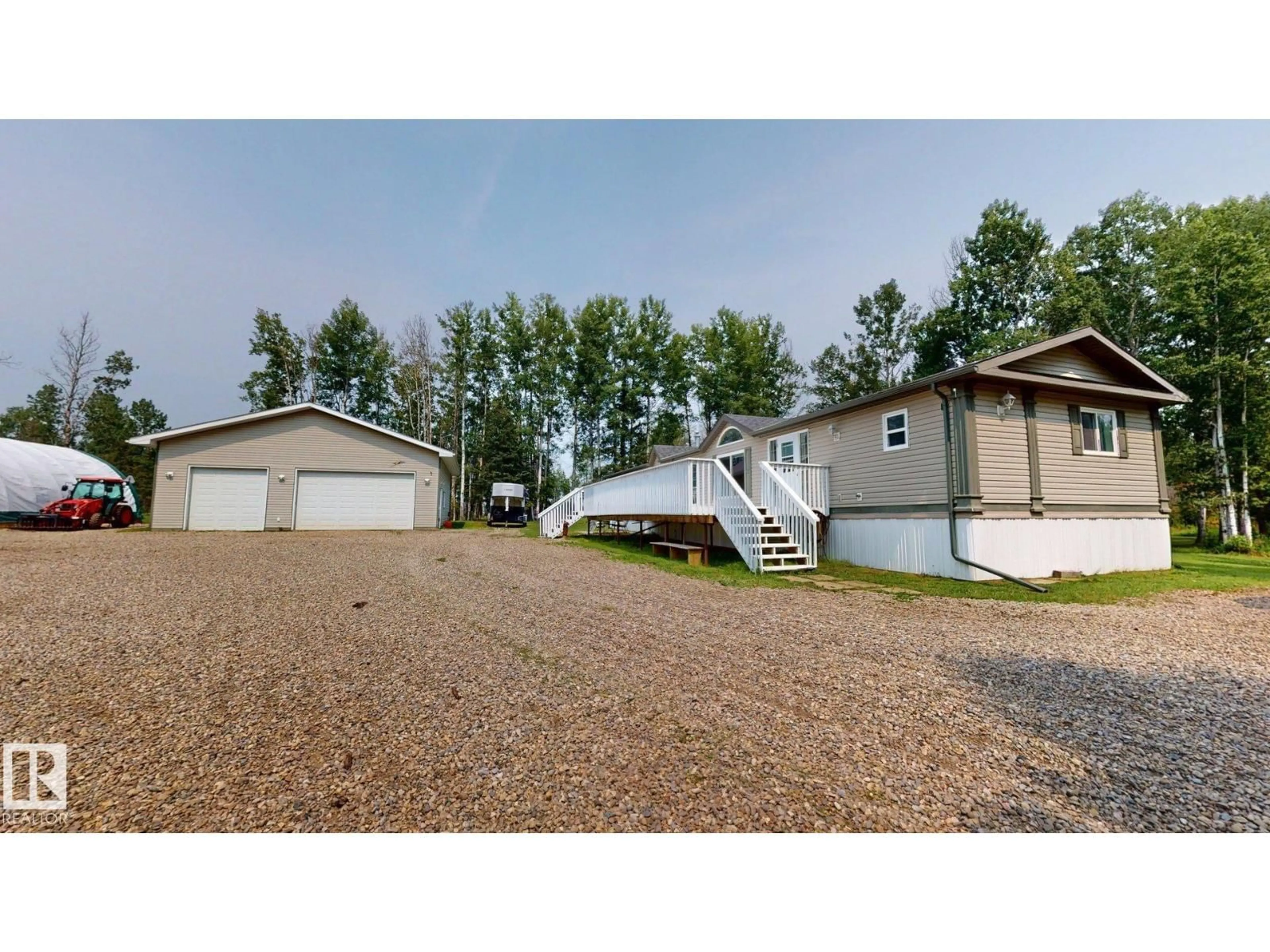 A pic from outside/outdoor area/front of a property/back of a property/a pic from drone, unknown for 9028 TWP 500 A, Rural Brazeau County Alberta T7A2A3