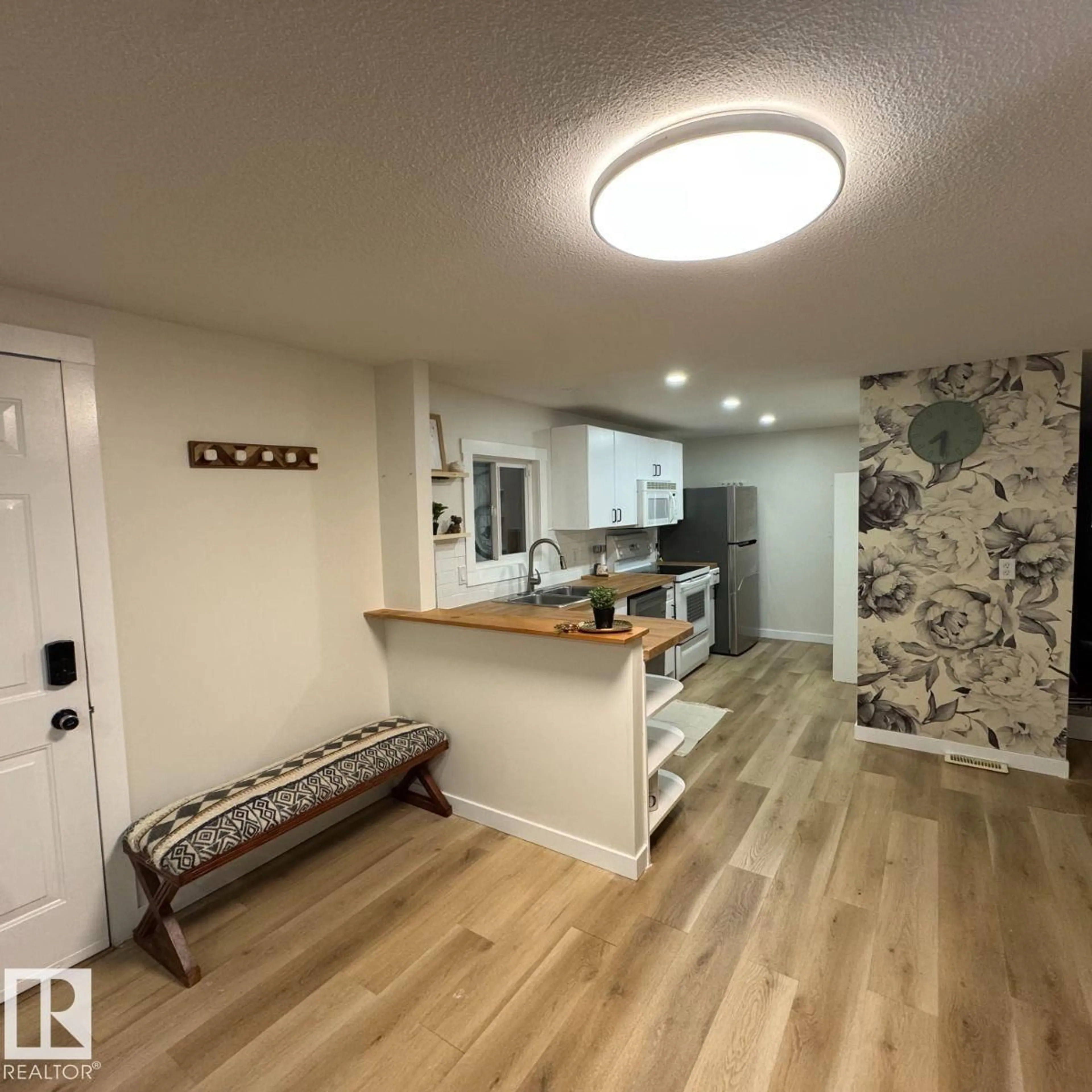 Open concept kitchen, wood/laminate floor for 8 THE PARKWAY NW, Edmonton Alberta T6P1C7