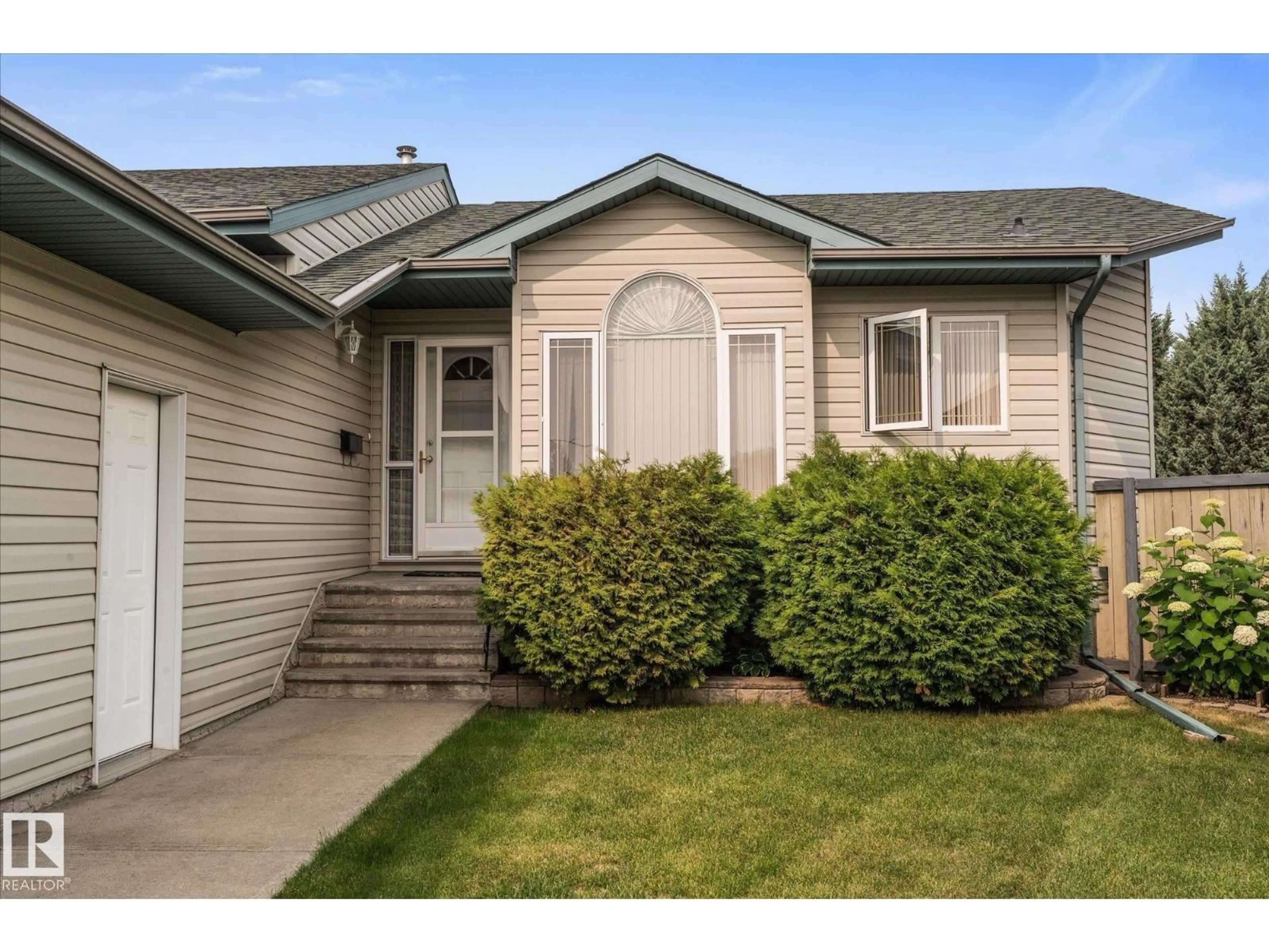Home with vinyl exterior material, street for 16 SIMONETTE CR, Devon Alberta T9G1Y5
