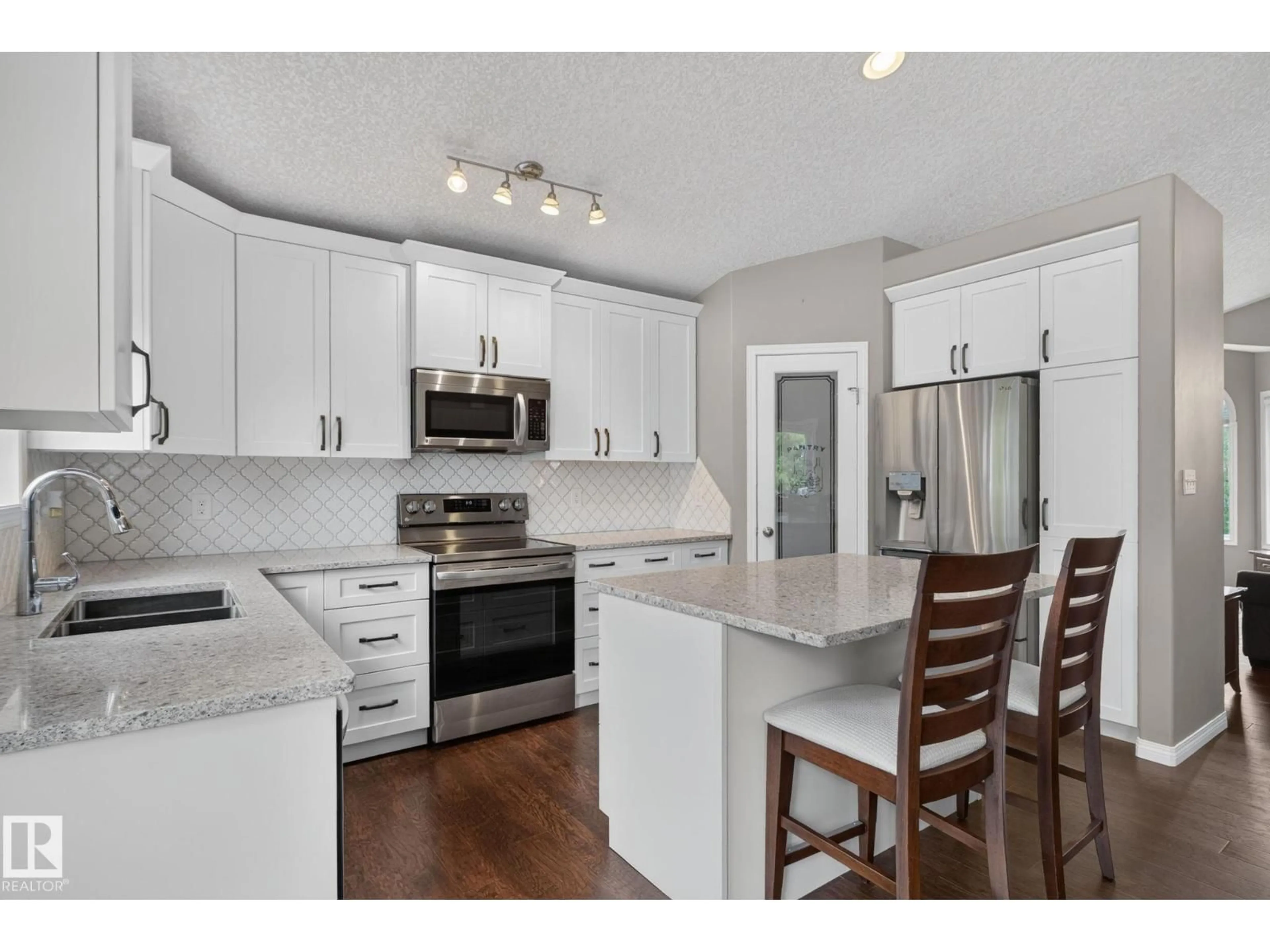 Open concept kitchen, unknown for 4914 152A AV, Edmonton Alberta T5Y3C1