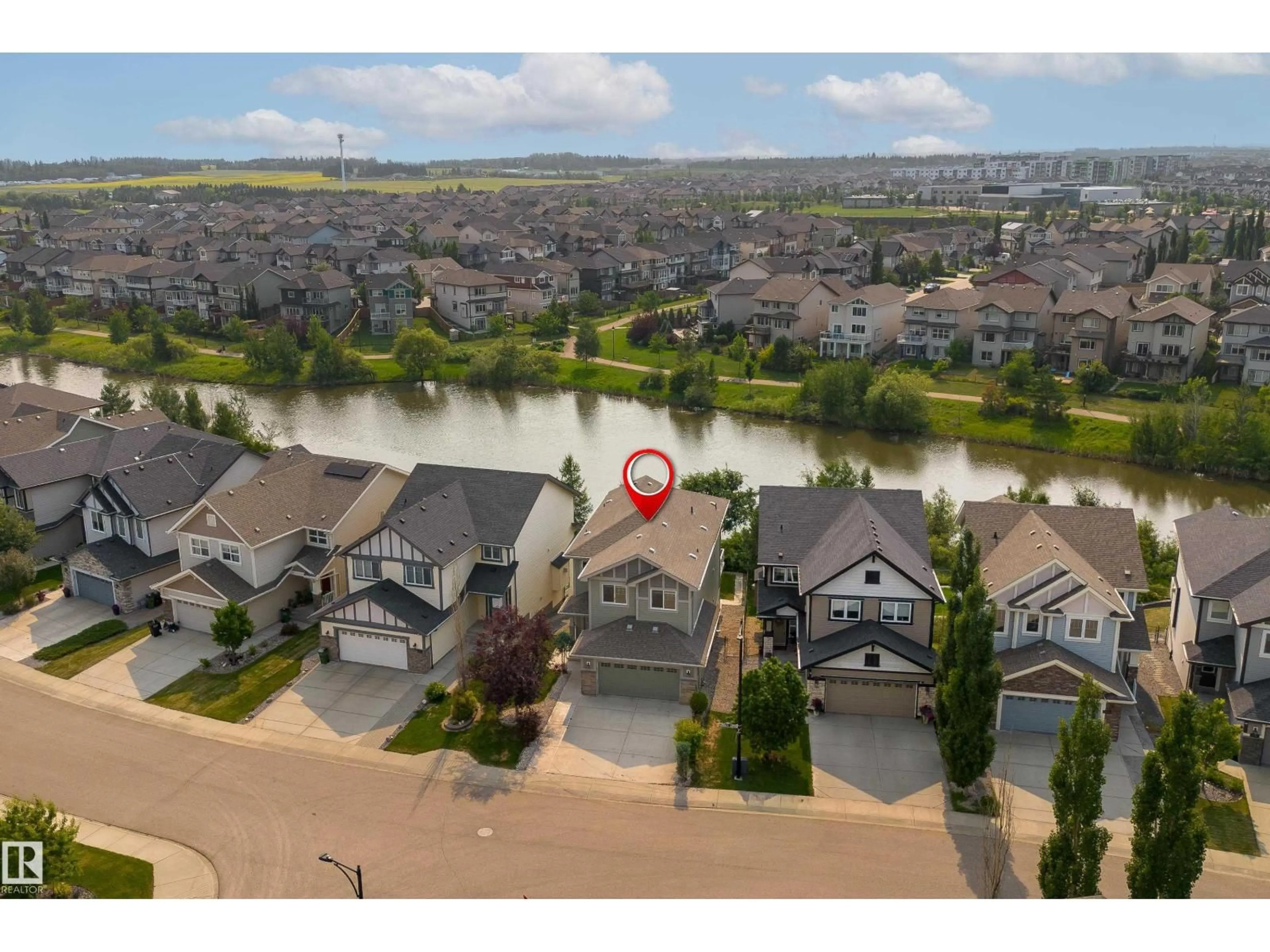 A pic from outside/outdoor area/front of a property/back of a property/a pic from drone, water/lake/river/ocean view for 3301 ABBOTT CR, Edmonton Alberta T6W2M3