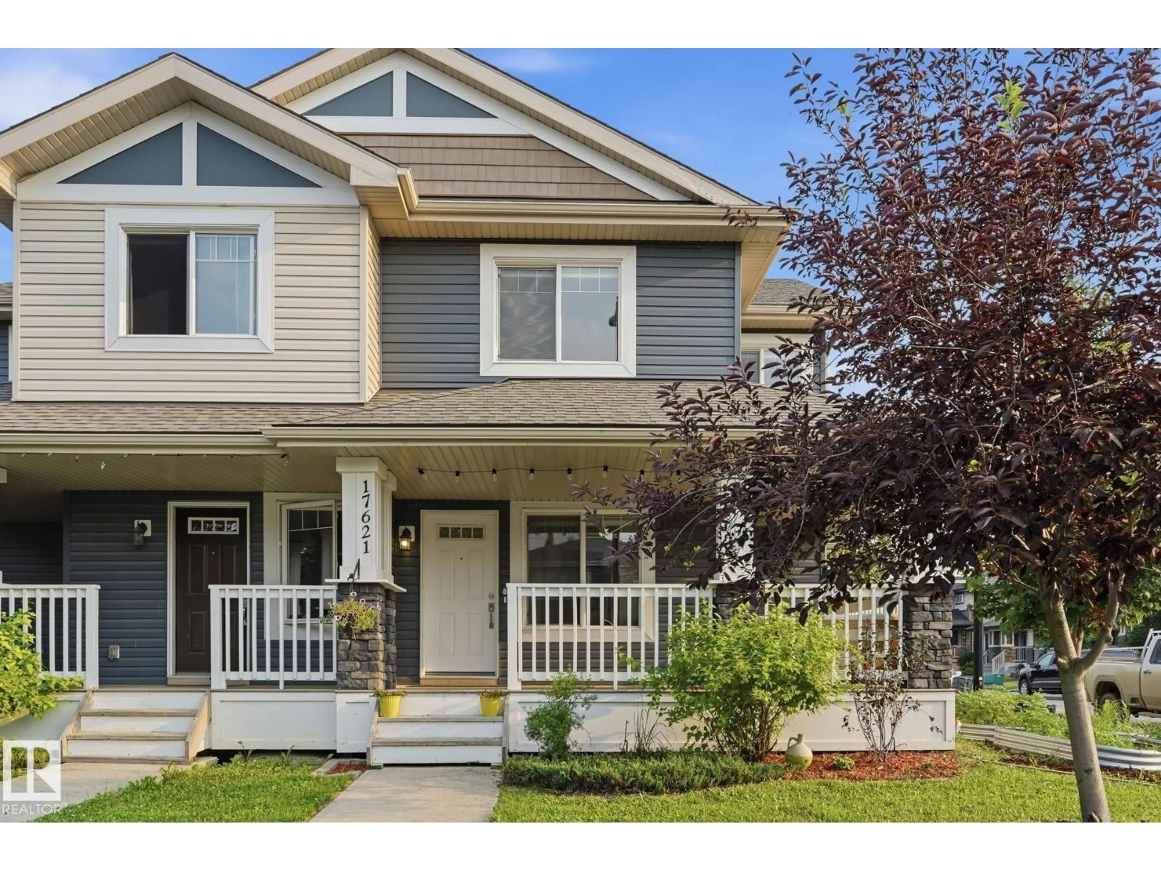 Home with vinyl exterior material, street for 17621 10 AV SW, Edmonton Alberta T6W1Z9