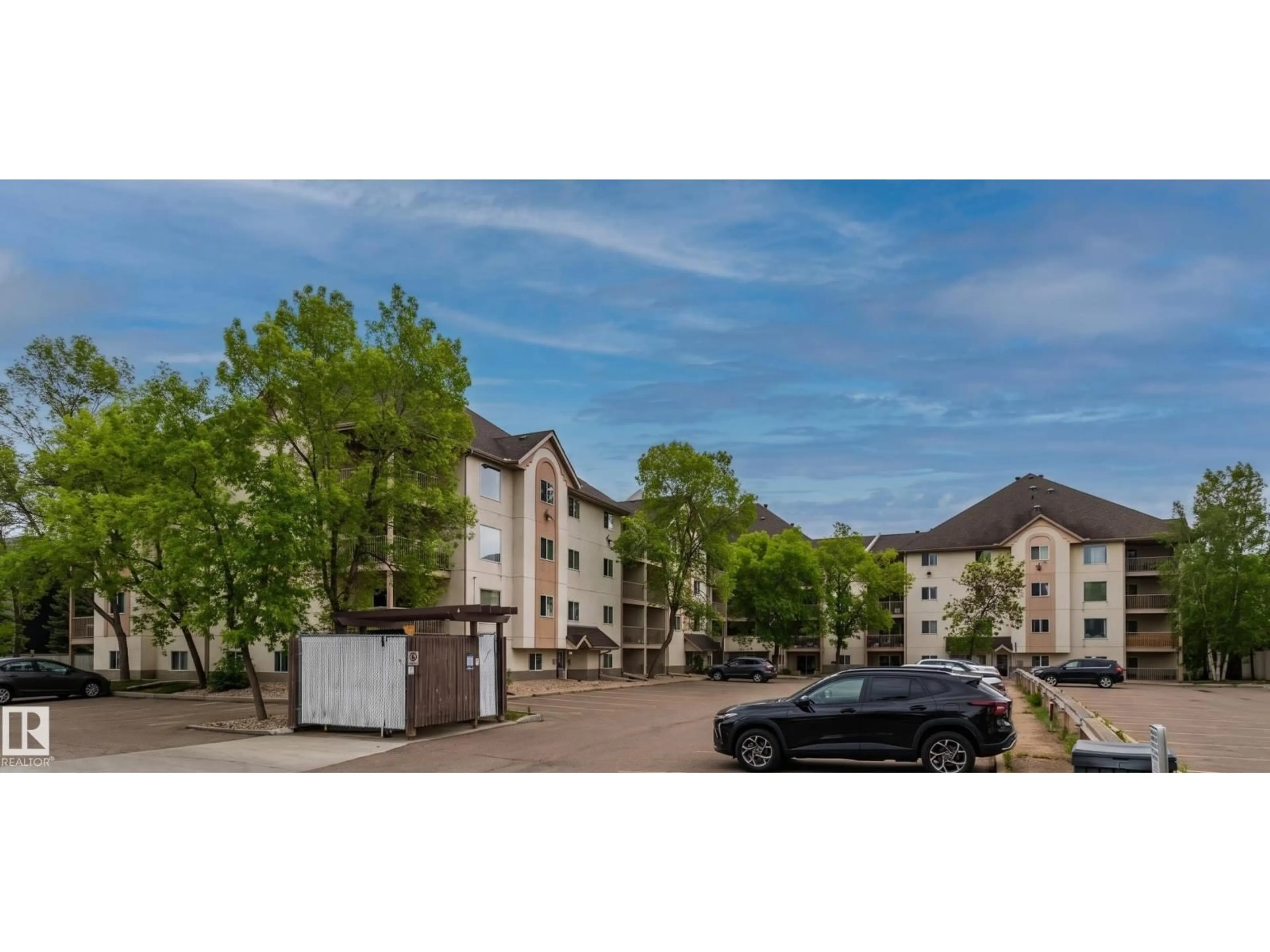 A pic from outside/outdoor area/front of a property/back of a property/a pic from drone, street for #104 - 17109 67 AV, Edmonton Alberta T5T6E6