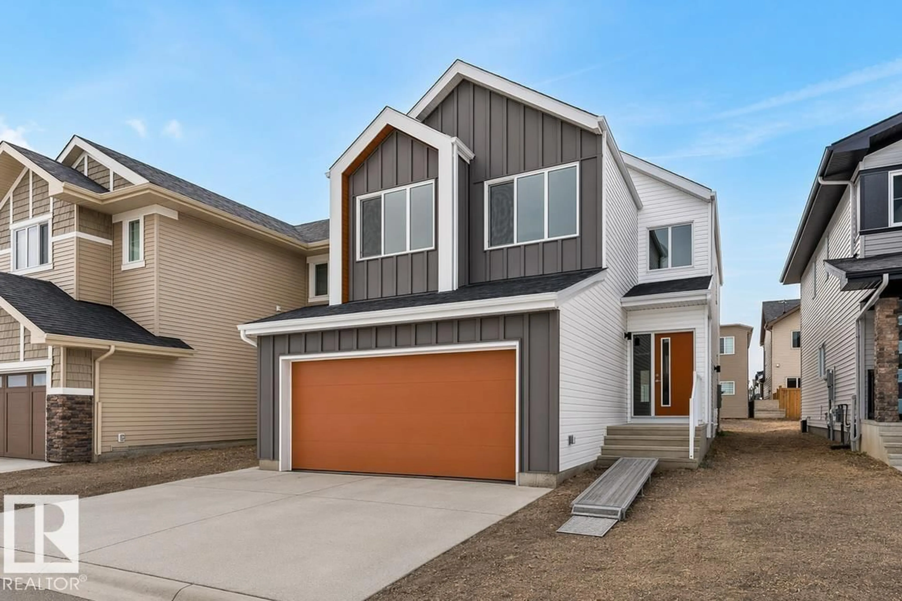 Home with vinyl exterior material, street for NW - 2728 194 ST, Edmonton Alberta T6M3B1