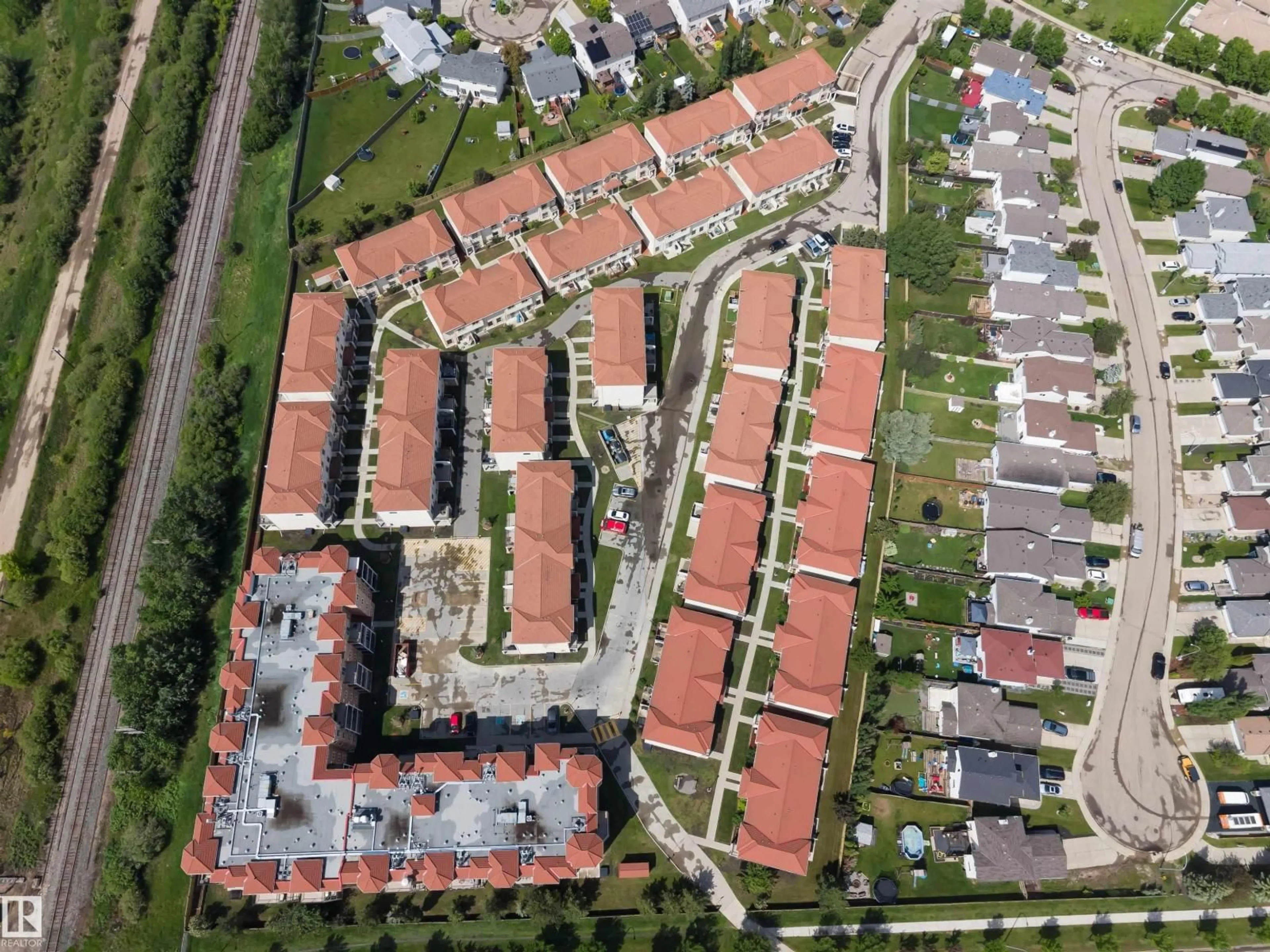 A pic from outside/outdoor area/front of a property/back of a property/a pic from drone, street for 27 13825 155 AV NW, Edmonton Alberta T6V0B8