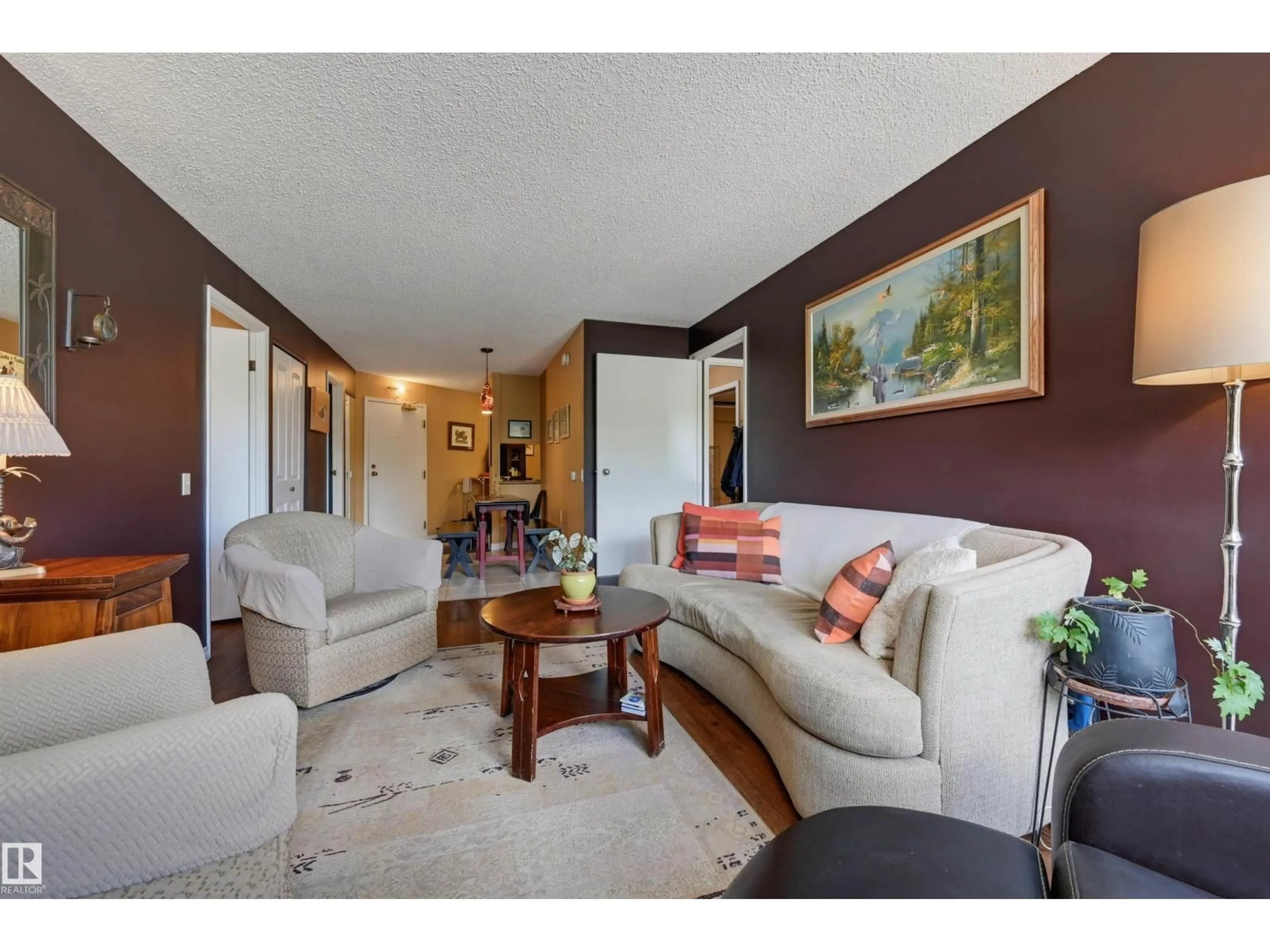 Living room with furniture, unknown for 210 - 10149 SASKATCHEWAN DR, Edmonton Alberta T6E6B6