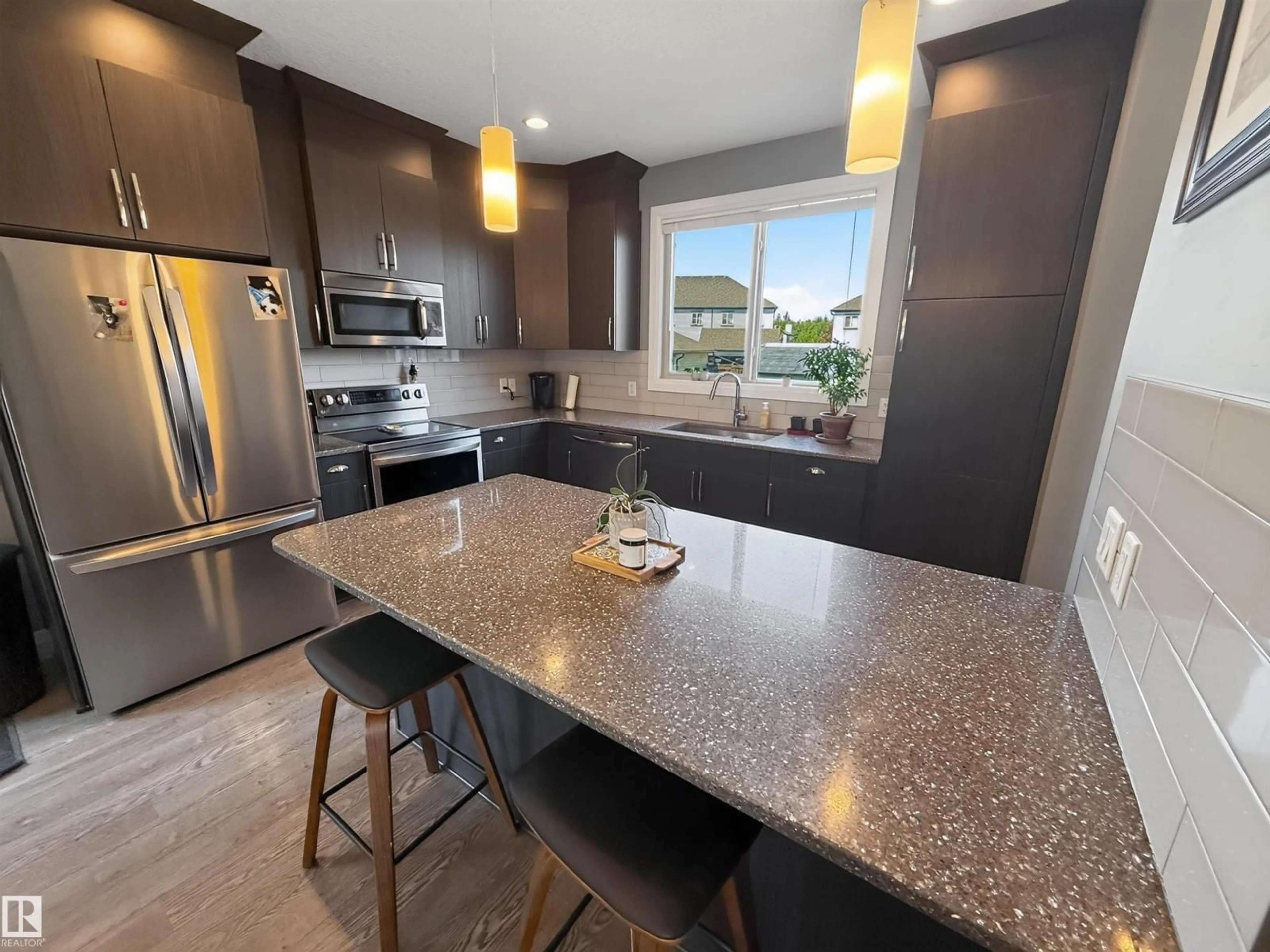 Open concept kitchen, unknown for 124 GILMORE WY, Spruce Grove Alberta T7X0M5