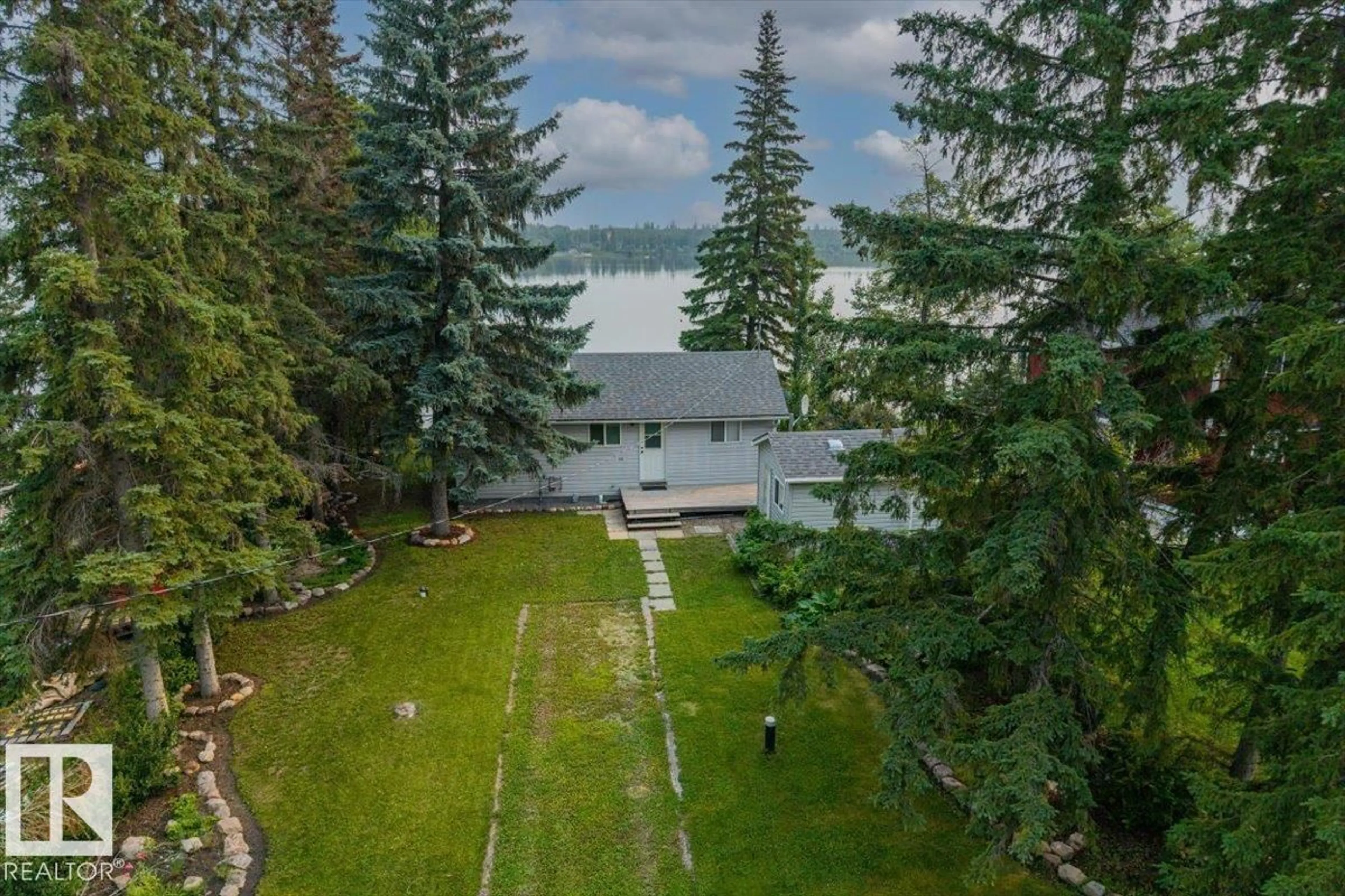 A pic from outside/outdoor area/front of a property/back of a property/a pic from drone, water/lake/river/ocean view for 5564 NAKAMUN DR, Rural Lac Ste. Anne County Alberta T0E1A0