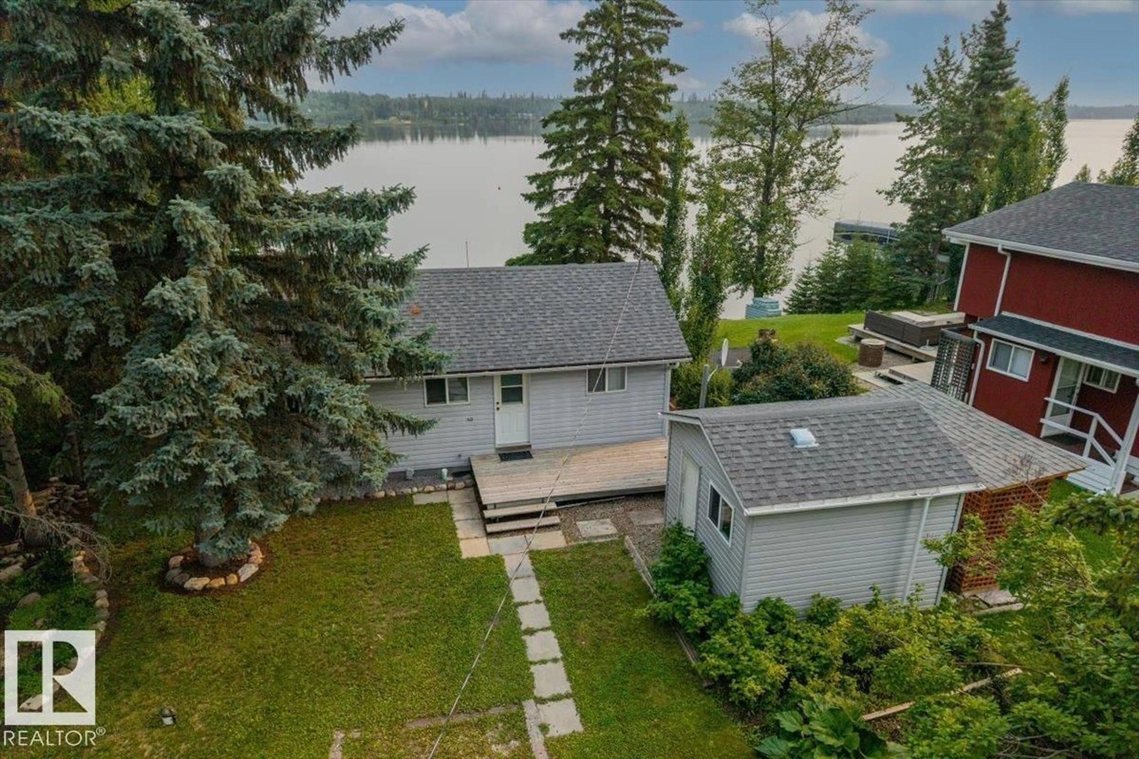 A pic from outside/outdoor area/front of a property/back of a property/a pic from drone, water/lake/river/ocean view for 5564 NAKAMUN DR, Rural Lac Ste. Anne County Alberta T0E1A0