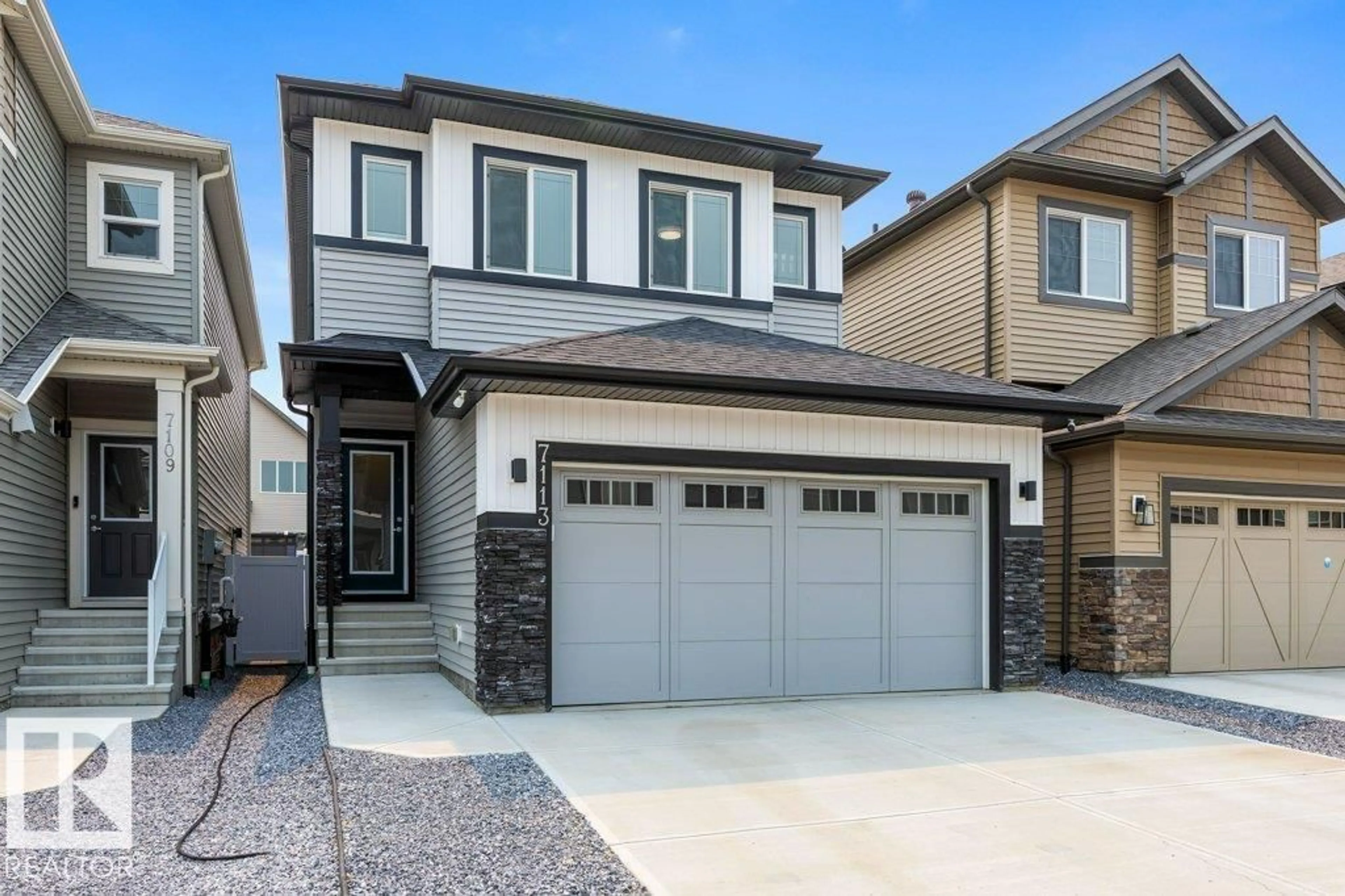 Home with vinyl exterior material, street for 7113 177A AV, Edmonton Alberta T5Z0T4