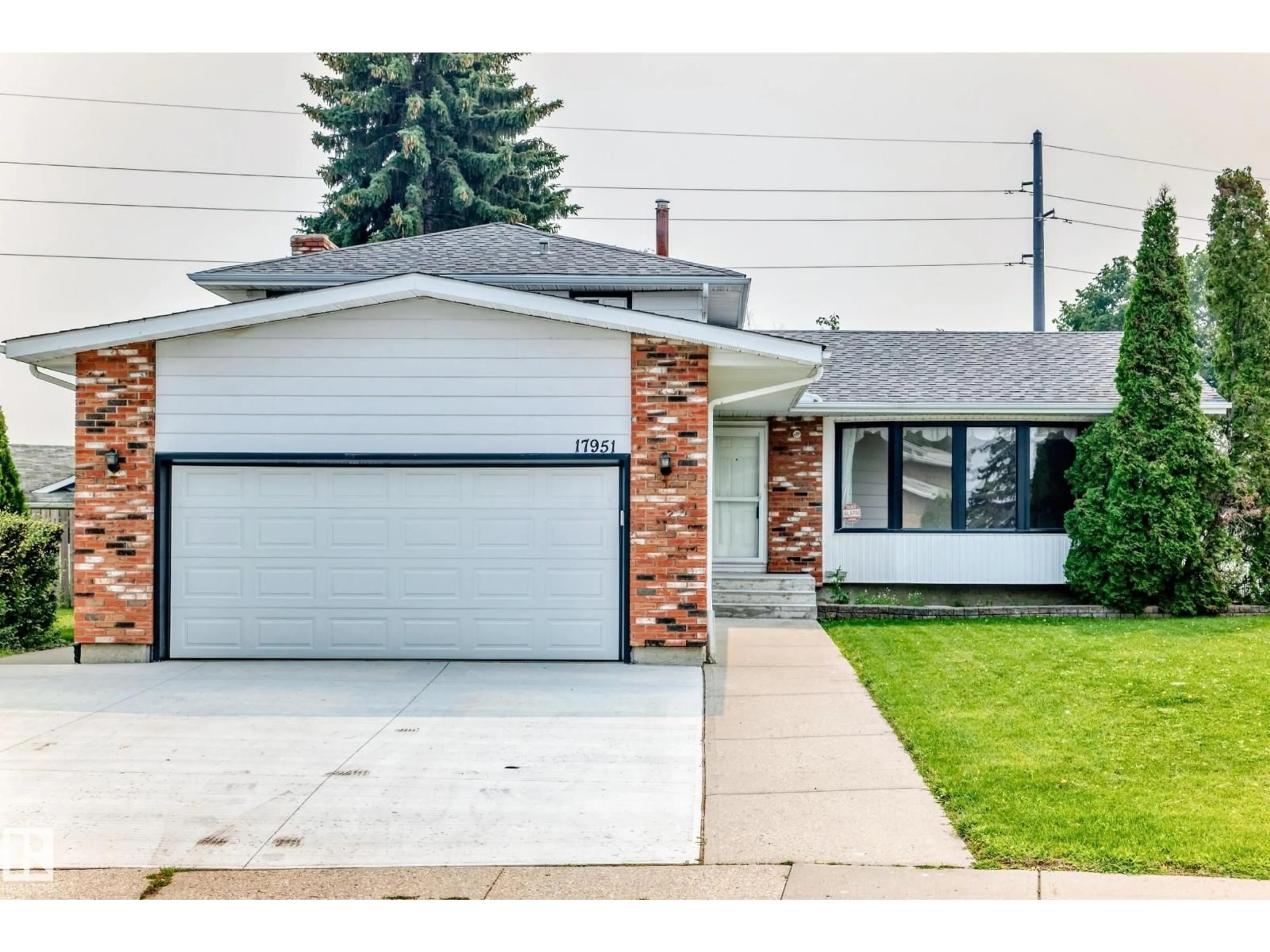 Home with vinyl exterior material, street for NW - 17951 80 AV, Edmonton Alberta T5T0S6