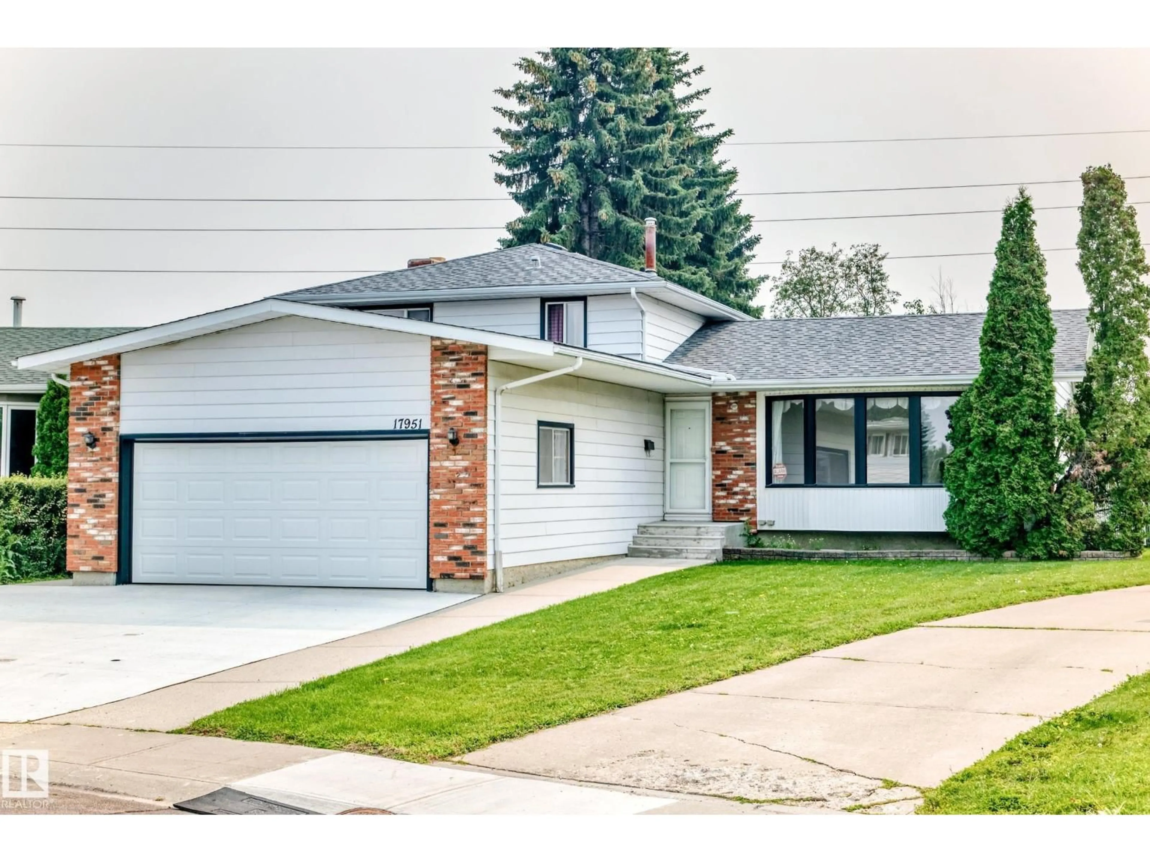 Home with vinyl exterior material, street for NW - 17951 80 AV, Edmonton Alberta T5T0S6