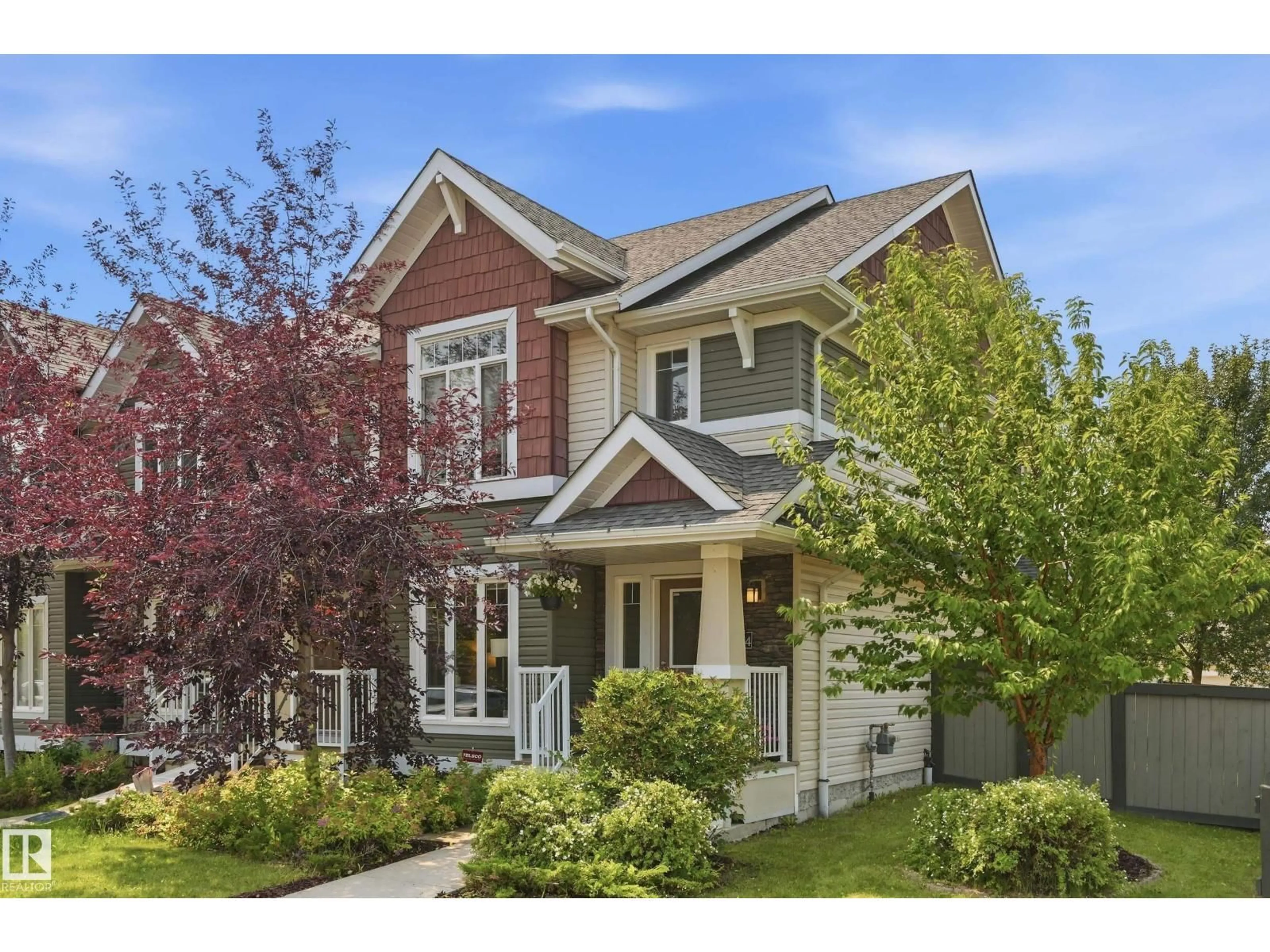 Home with vinyl exterior material, street for SW SW - 704 176 ST, Edmonton Alberta T6W2G7